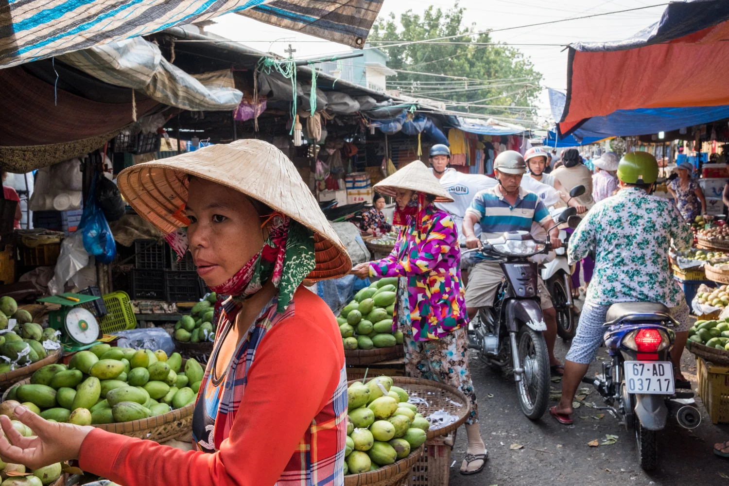 People crowd the daily market in Chau Doc, Vietnam.