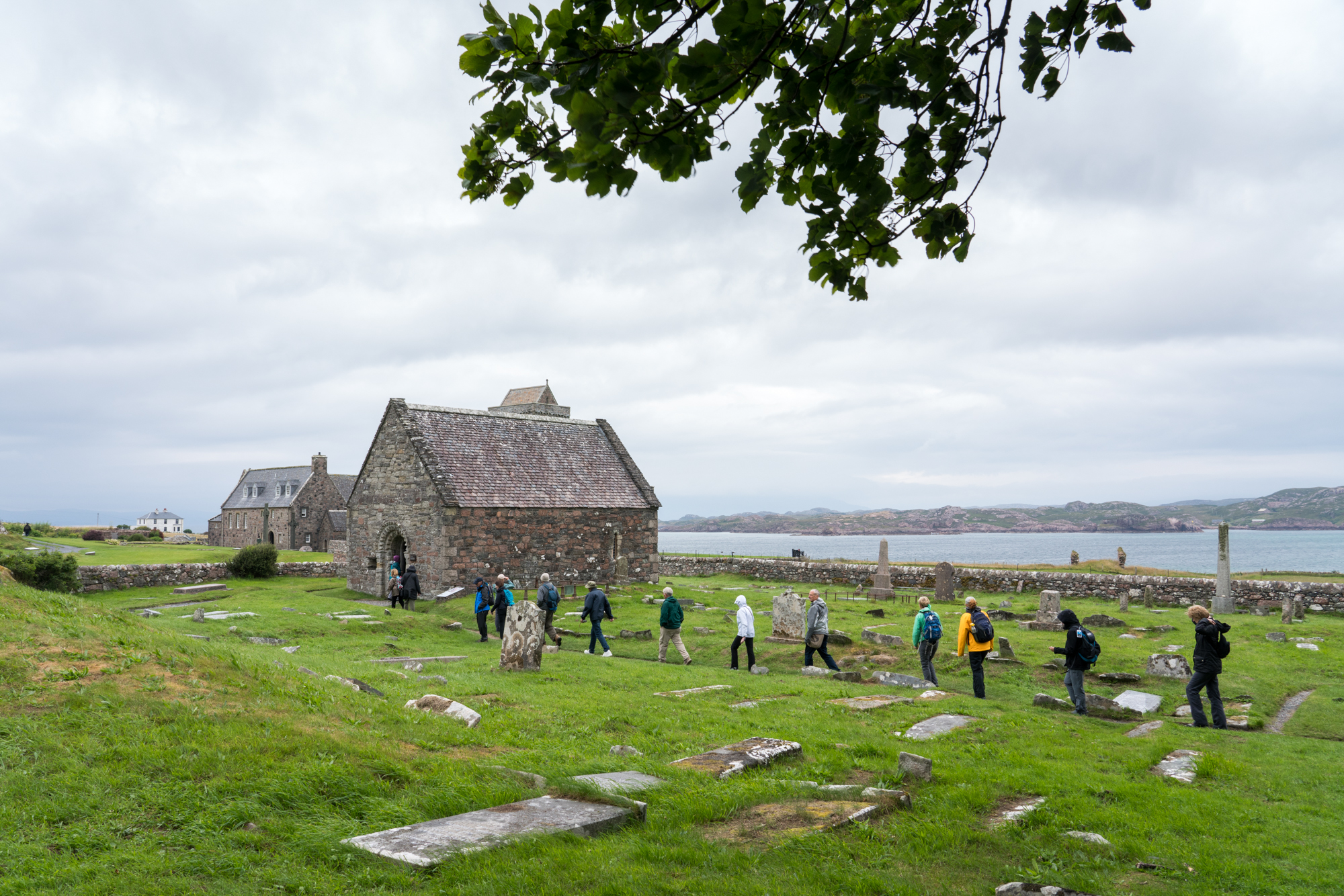  Guests walk through the cemetery on Iona, a place steeped in religious history. 