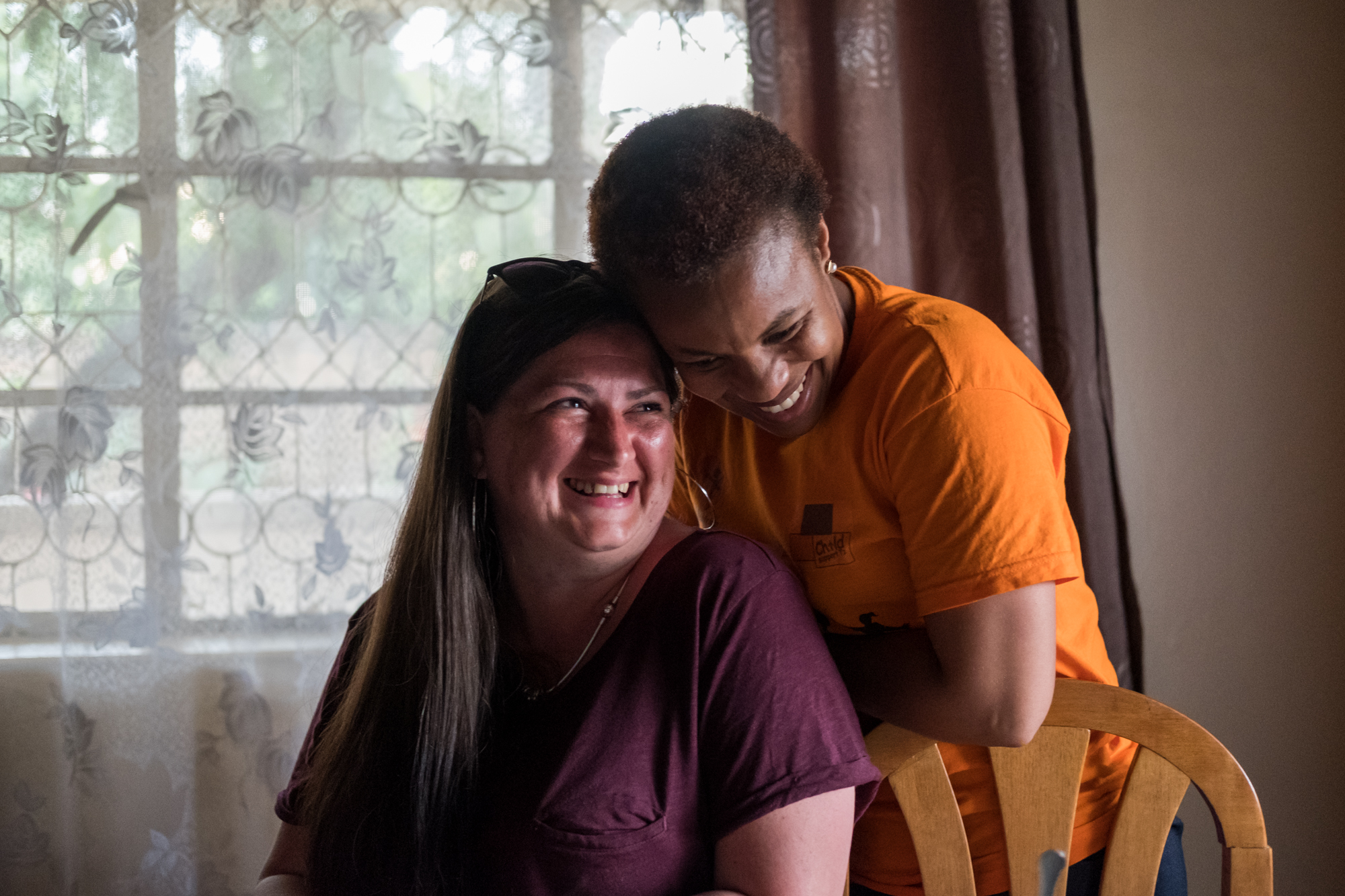  Holly (left) poses for a portrait with Noelah Msuya (right) in Noelah’s home in Mbeya, Tanzania. Noelah is the Executive Director of Child Support Tanzania, a non-governmental organization that educates disabled children. 