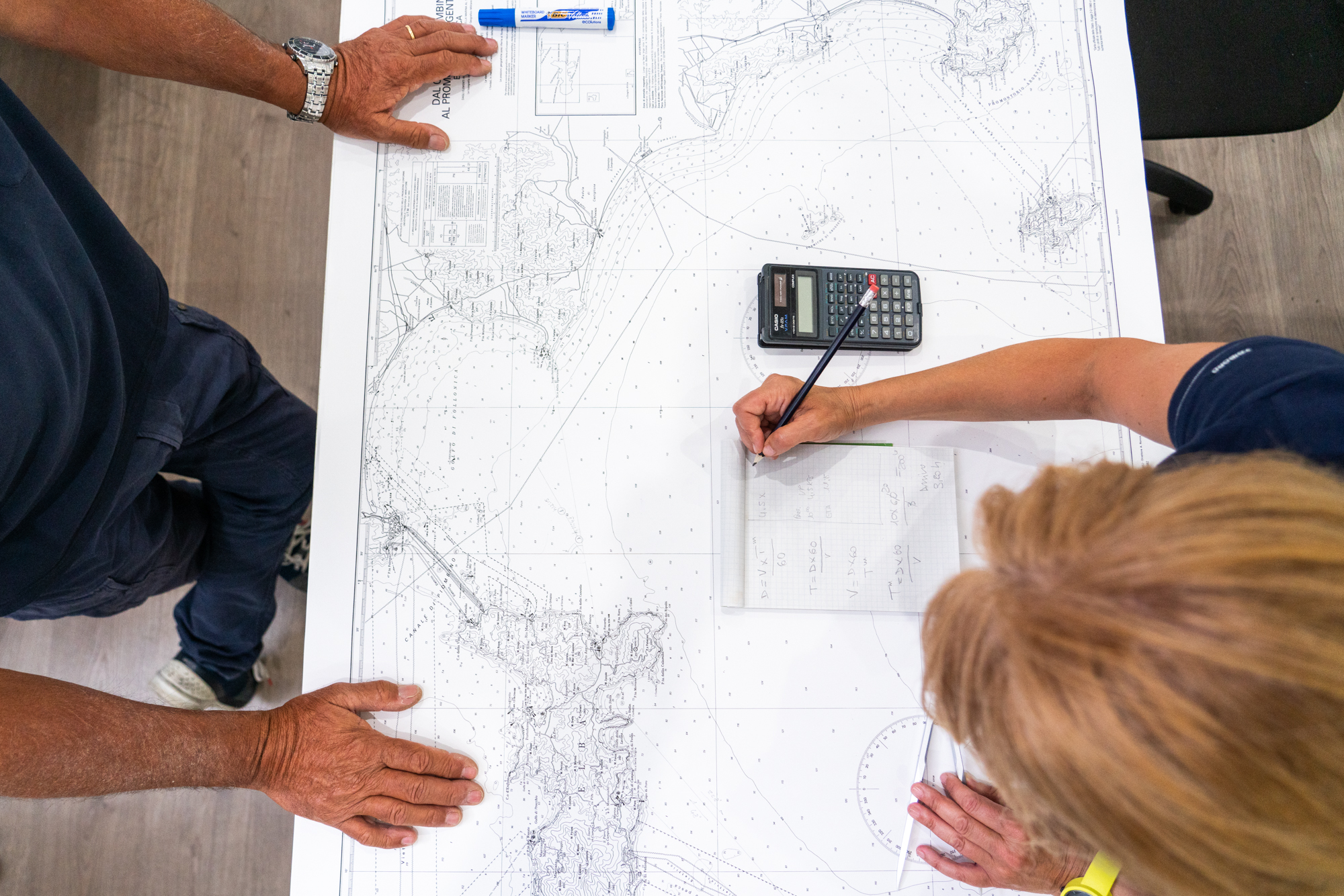  Patrizia Pilloni (right), a Hilton Team Member and Thrive Sabbatical winner, learns sailing knowledge from her instructor, Claudio Rinaldini (left), at the Newton Nautical School in Rome, Italy. Patrizia did practical theory for months alongside the