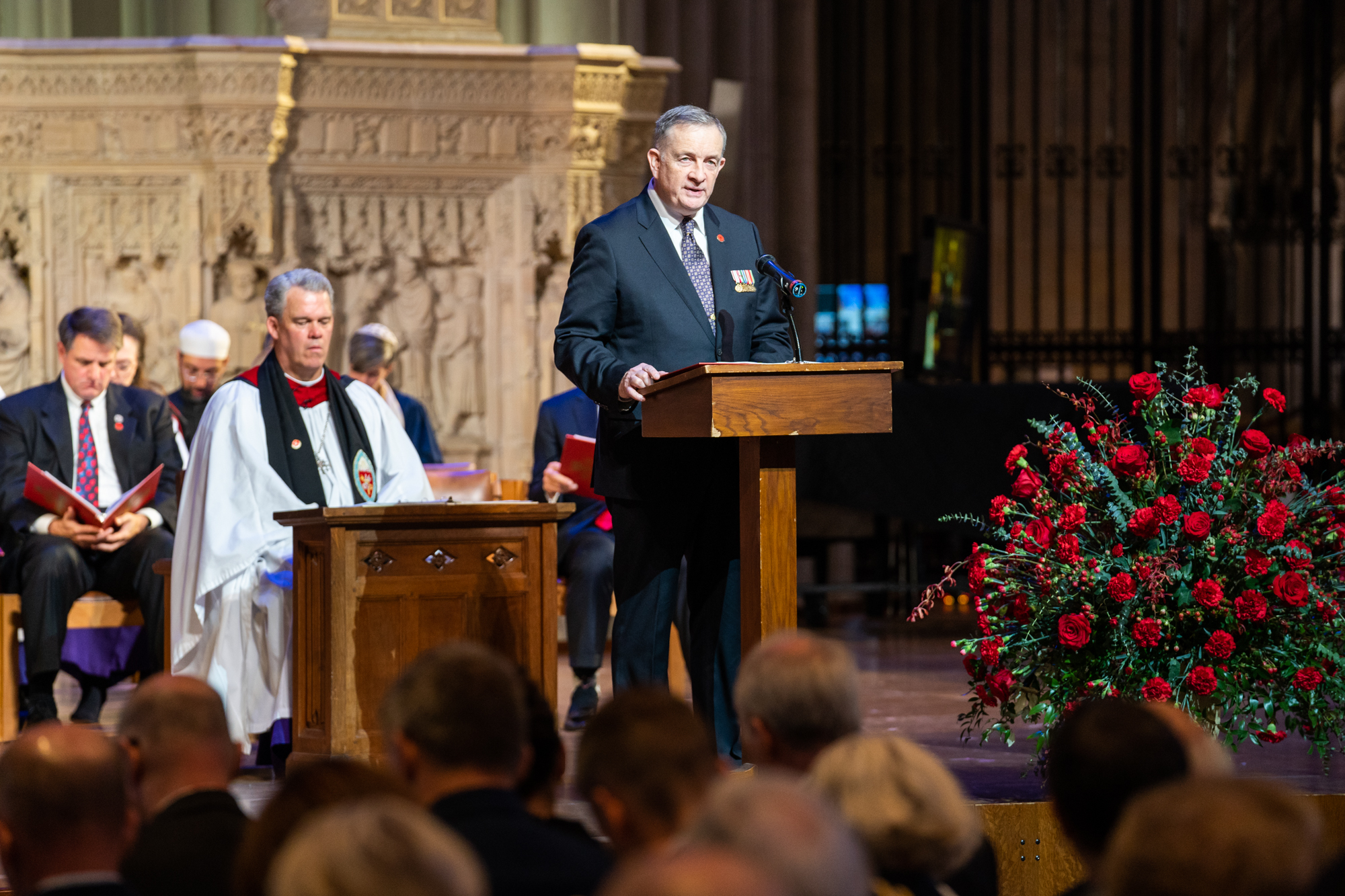  John D. Monahan, Commissioner and American Legion Representative, WWI Centennial Commission, reads a poem during the service. 