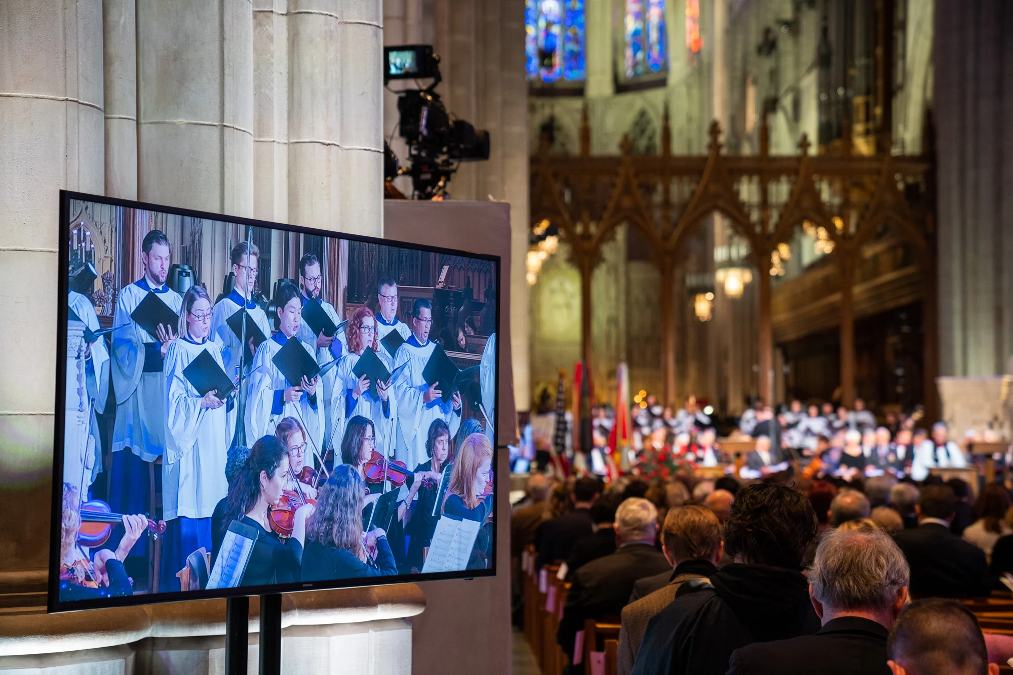The choir and orchestra join in song during the service.