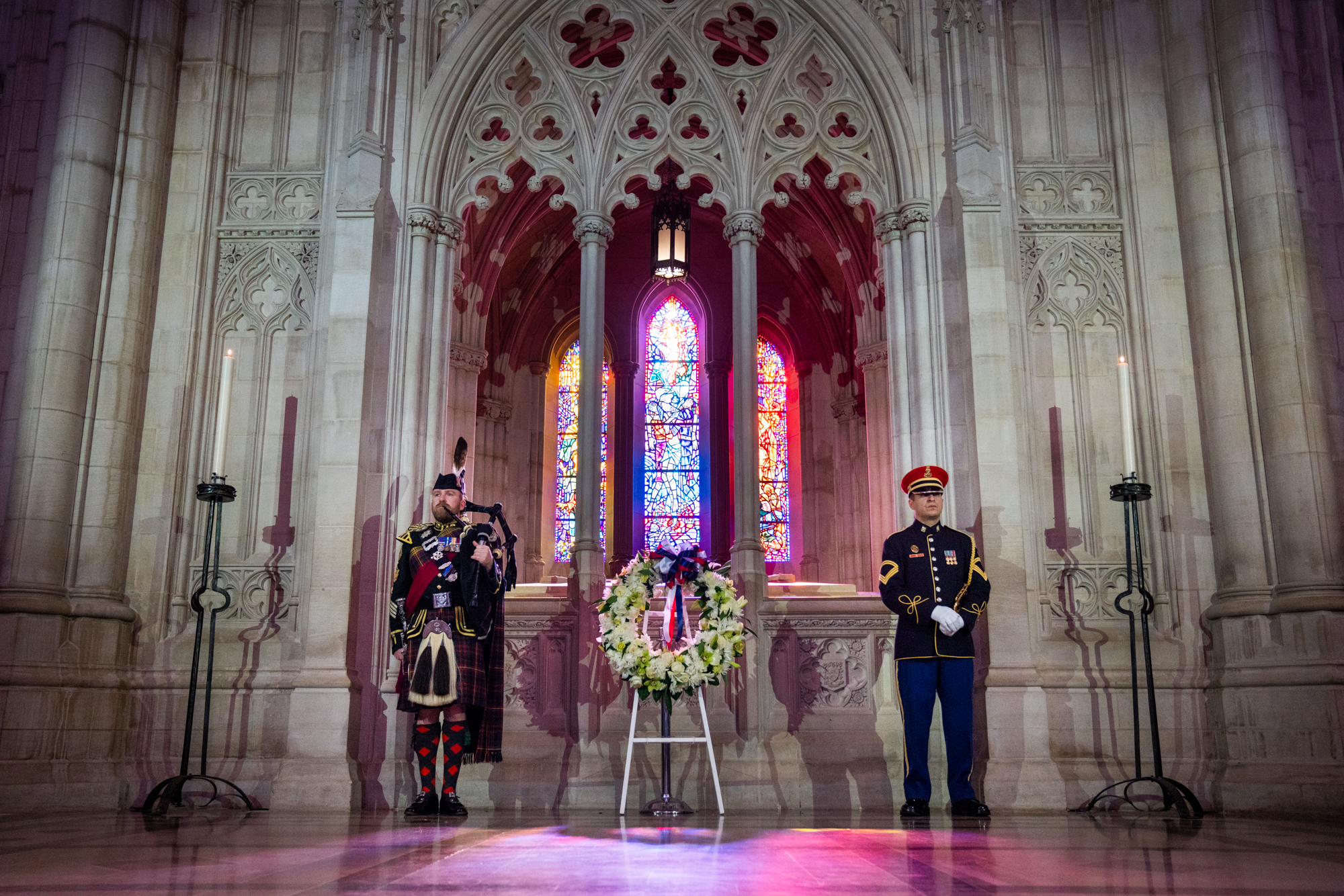  Peter MacGregor (left), Warrant Officer Class 2 Pipe Major, and a member of the U.S. Army Band (right) stand at attention alongside the centennial wreath. 