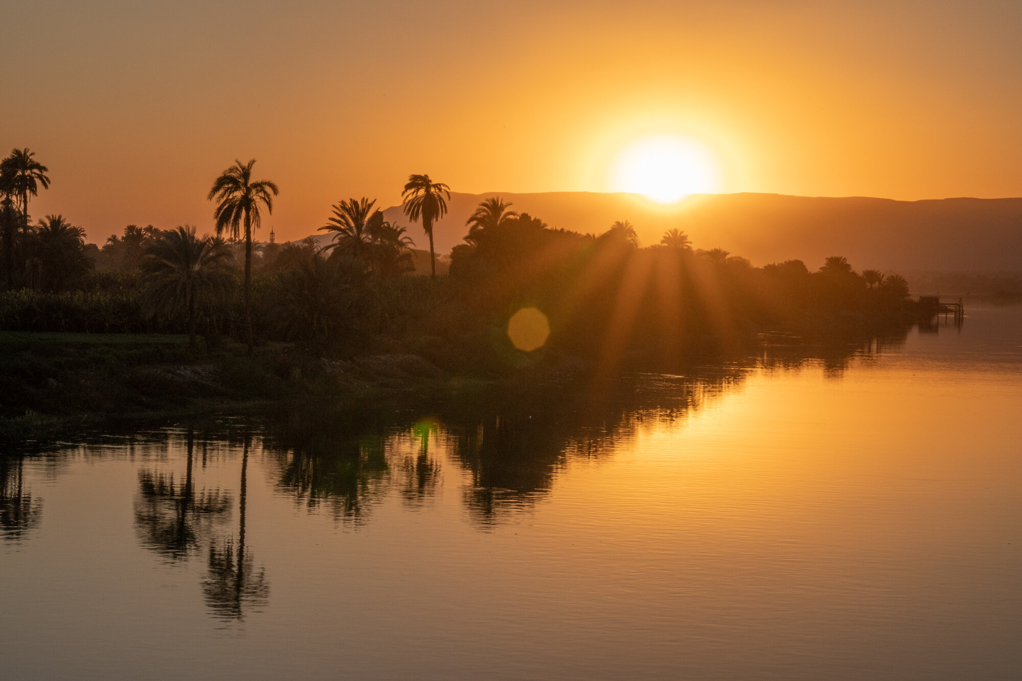 Eric Kruszewski photographs The Nile River at sunset in Luxor, Egypt for Lindblad Expeditions.