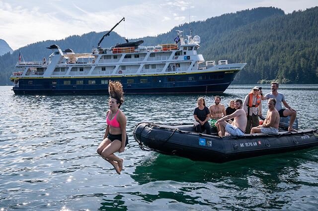 Good form. Check. Brace for impact. Yes. Time for a cold water plunge near Port Althorp in #Alaska. Photo made while exploring with @lindbladexp and @natgeoexpeditions