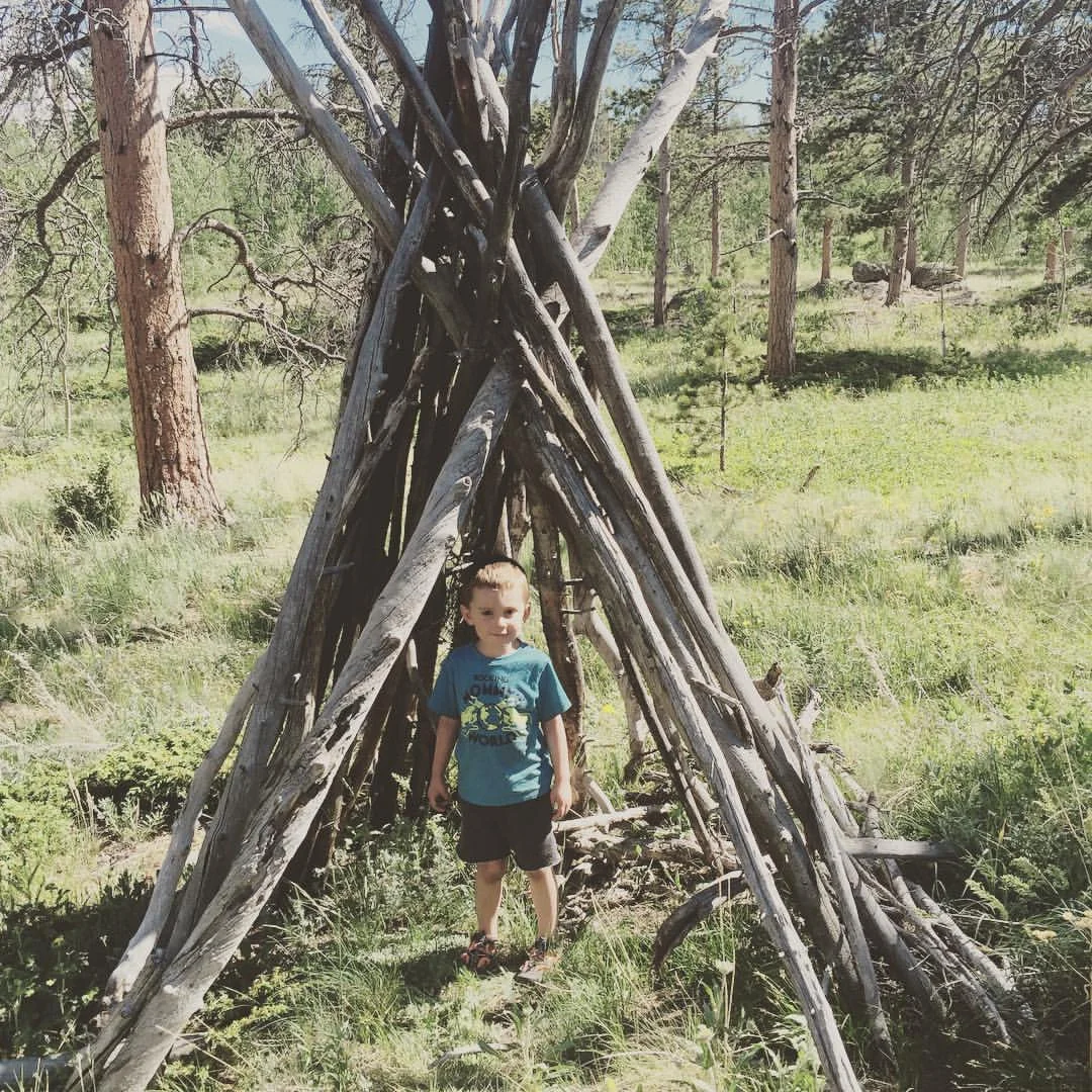 Discovering cool stuff in the forest with grandkids.