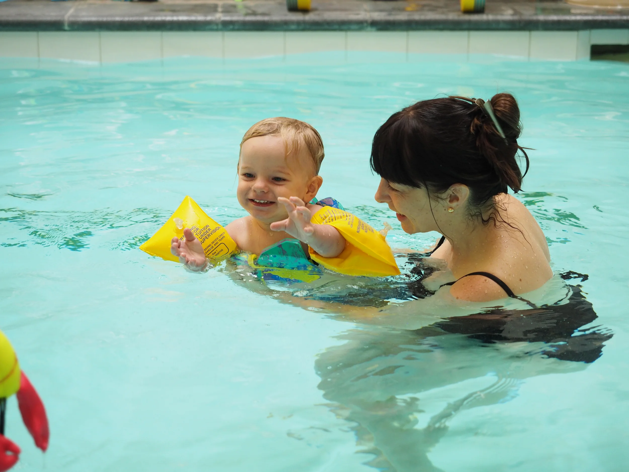 Small children love to learn to swim