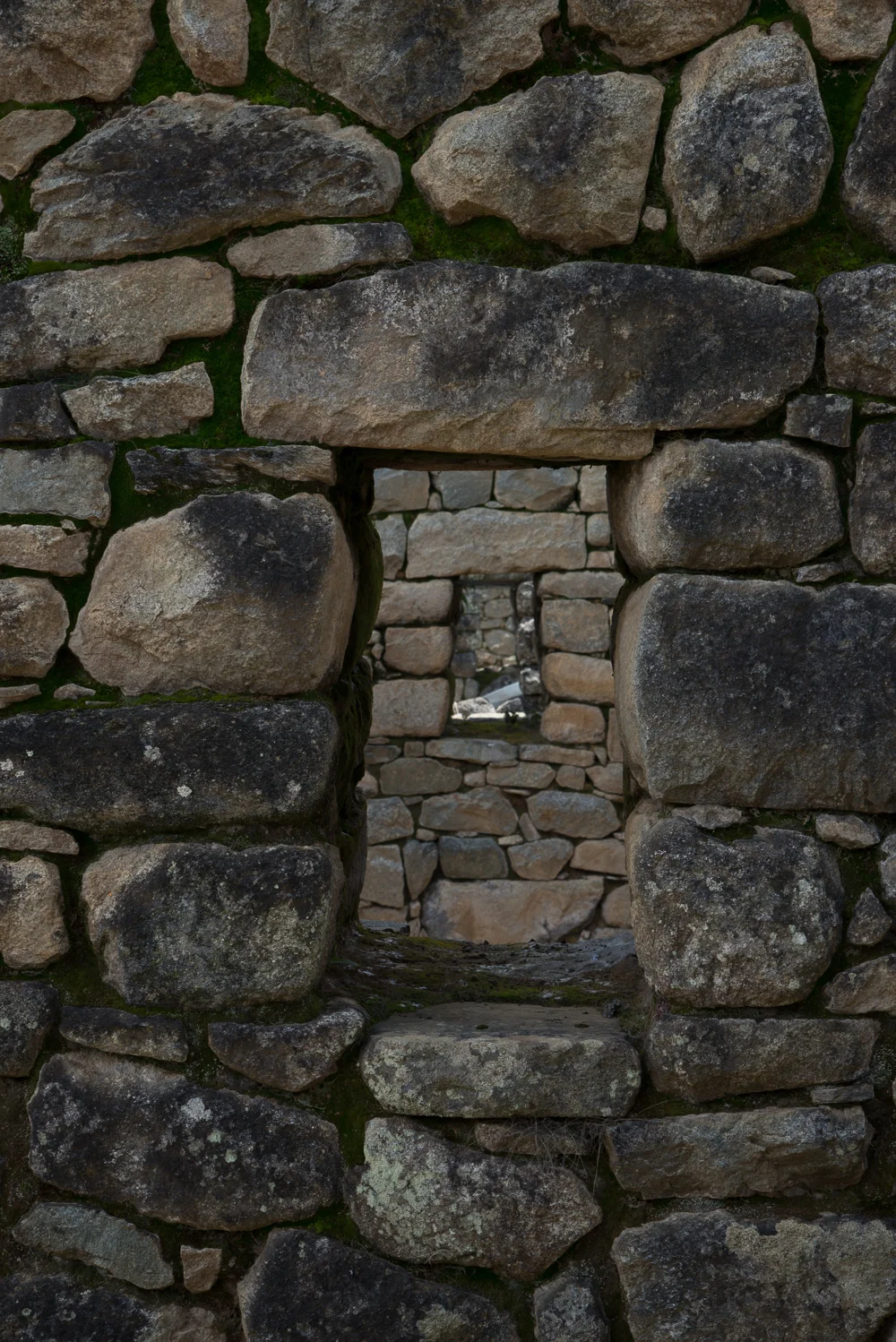 Here we can see from one space to another through a set of windows.