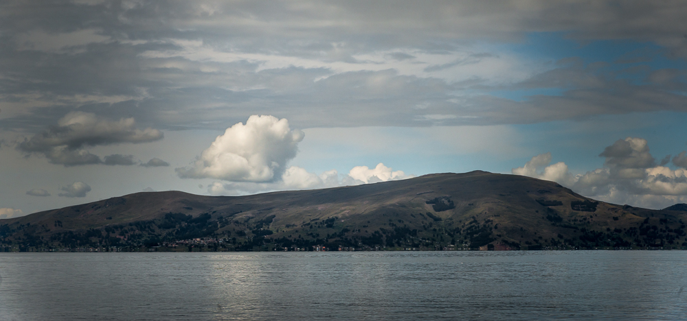 As we head over to Taquile Island, it is as if the sky and the lake are doing their best to show off for us.
