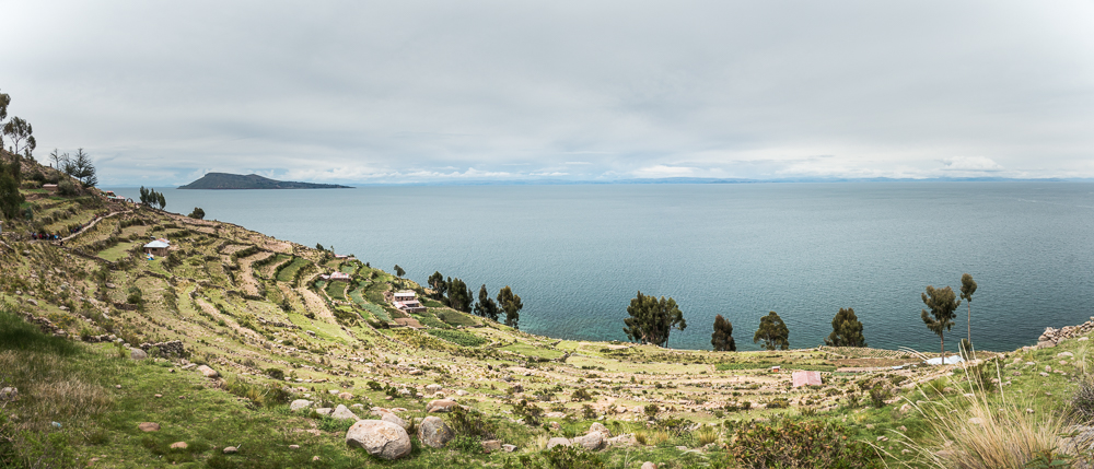 The lake looks amazing from here as well. We can see sheep and llamas in the fields, and again, we see the ever present terraces everywhere along the hills.