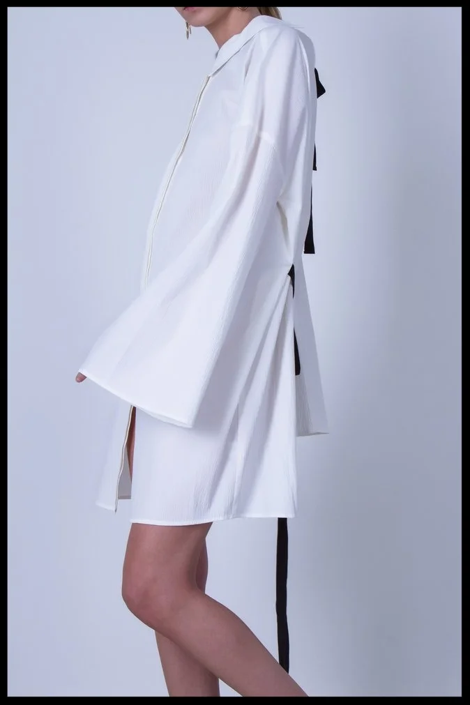 Oskar_x_kaity_modern_-_Australian_Fashion_Online_Collab_ft._Secret_Of_Change_White_shirt_dress_bell_sleeves_4_86694fa3-bb19-4a9f-9c27-32af3454eaca_1024x1024.jpg