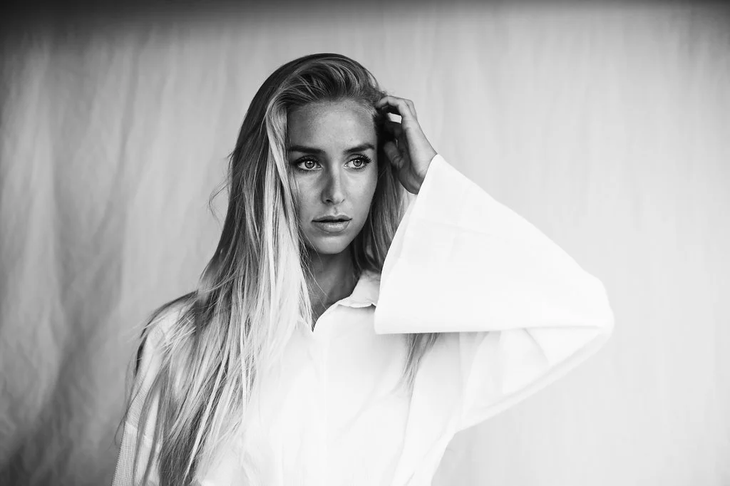 Catie wears Oskar The Label - Secret Of Change Tie Back Cotton Shirt Dress