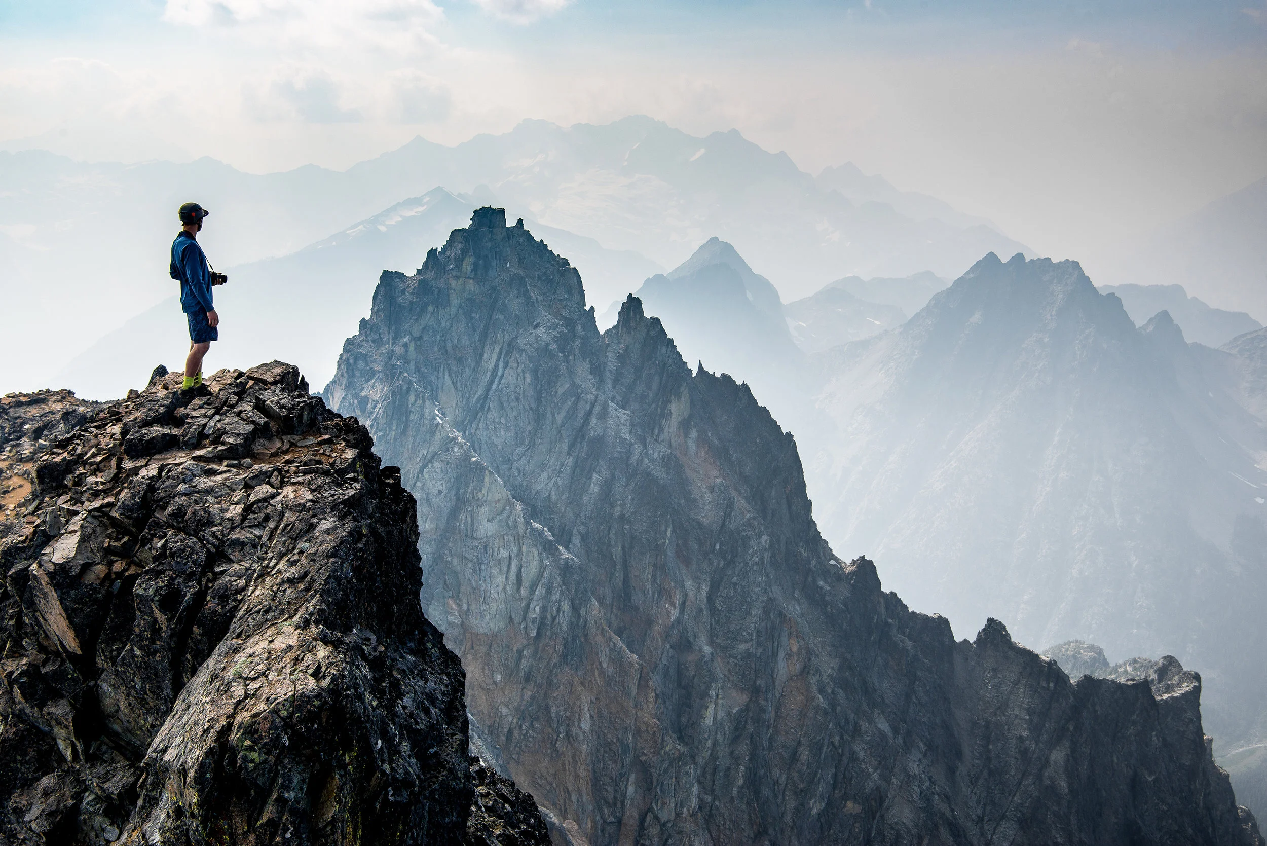 Lucas ( @photoswithfern ) on the summit of Black Peak.