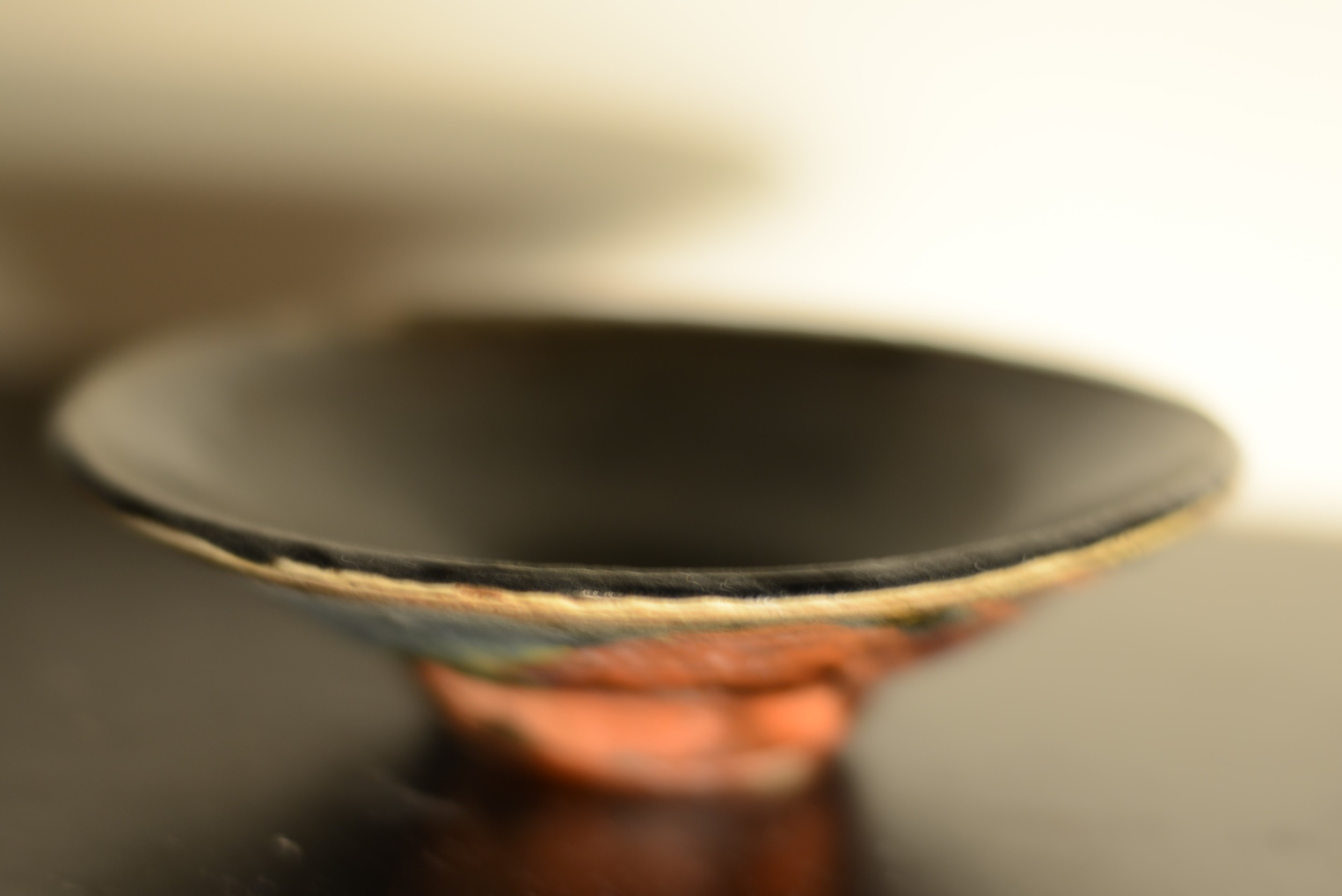 Close-up of a copper pipe fitting or valve.