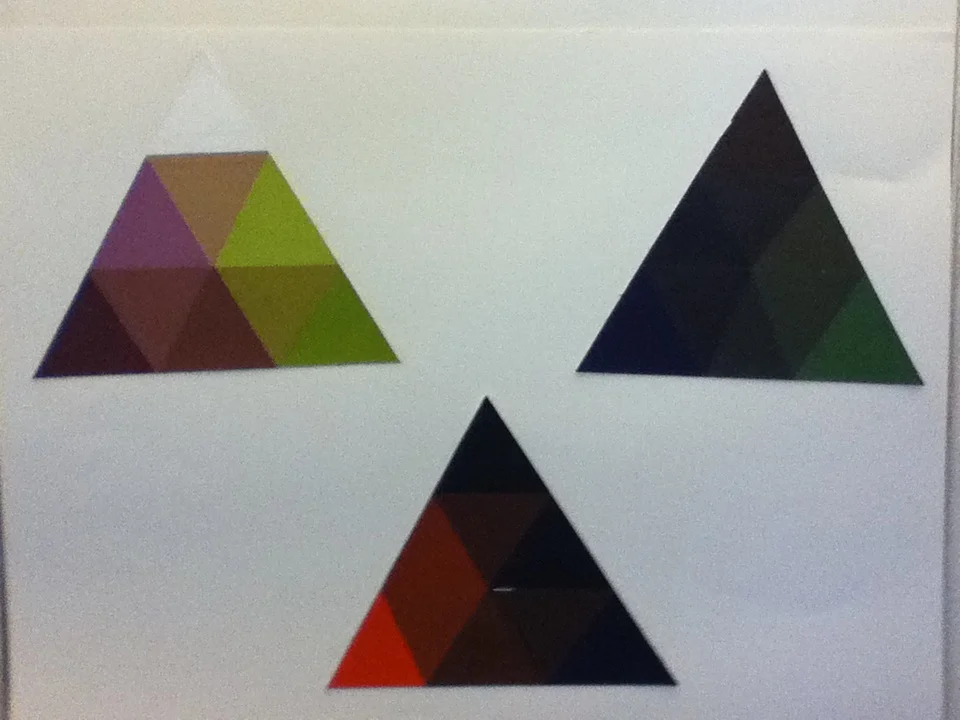 Three abstract triangular patterns with various color shades on a white background.