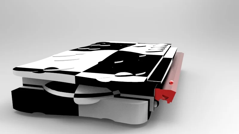 A partially assembled mechanical puzzle with black and white puzzle pieces on a gray surface.