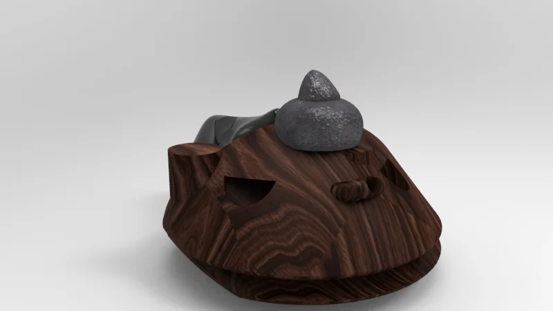 A wooden sculpture of a turtle with two rocks stacked on its back.