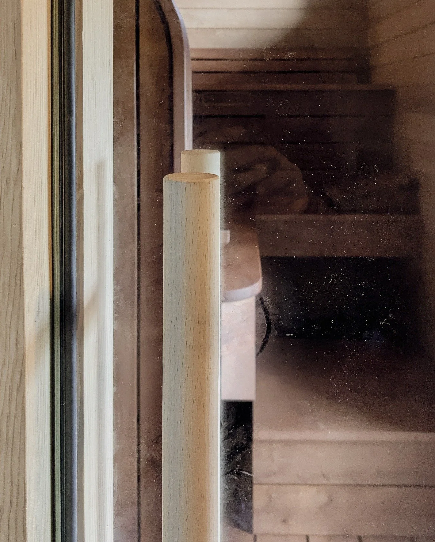 Sauna details 

Featuring a curved wall, movable headrests, a glass door, and bench boards with movable angled backrests for comfort, all crafted from thermo wood, this design now completes an inviting thermal bathing experience. 

Commissioned by @p
