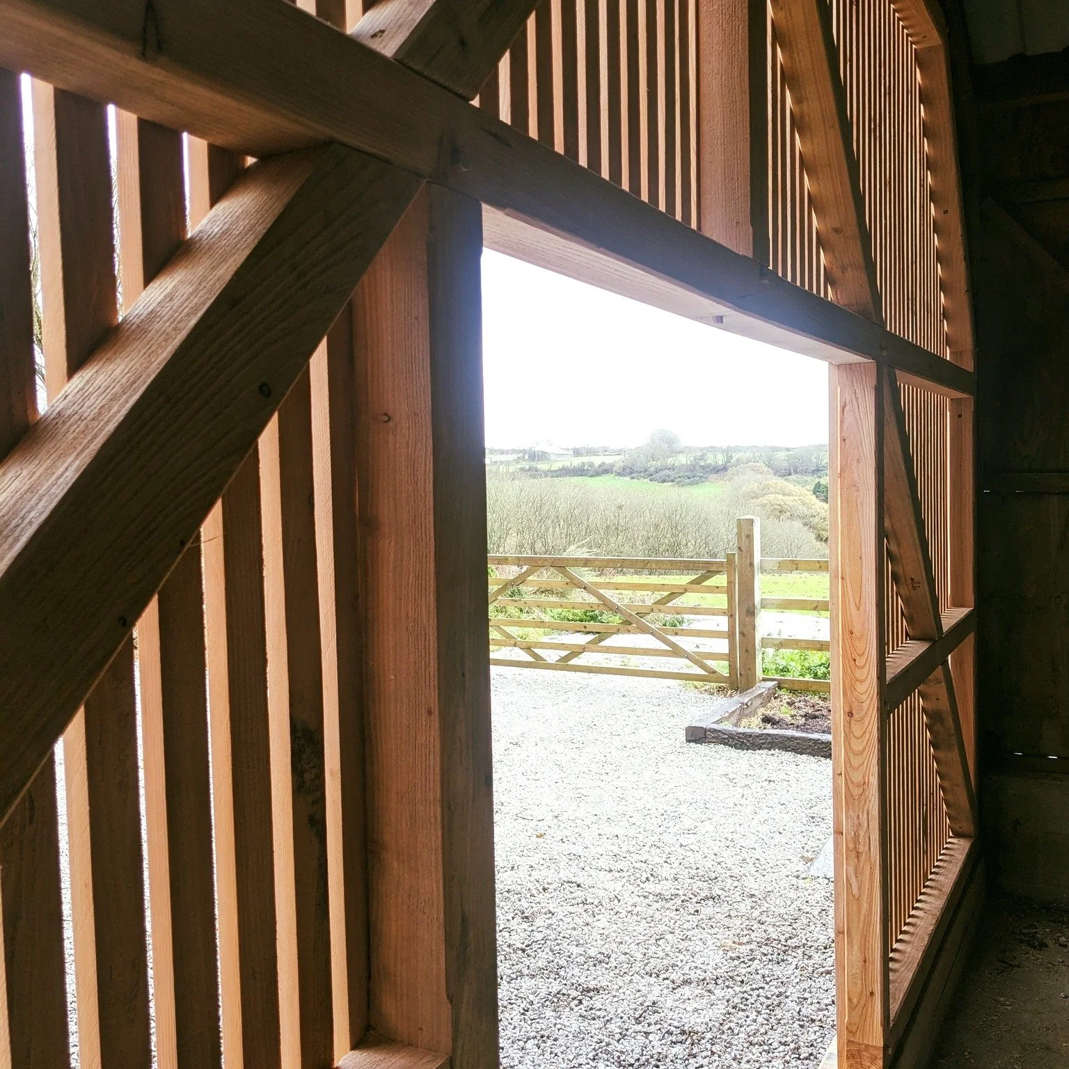 Slatted Larch Framed Barn Front

Making this open ended barn more usable by adding a little more protection and weatherproofing in the form of a retrofitted slatted doorway. One day this will become an outdoor kitchen/dining area 〰️

Key features:
- 