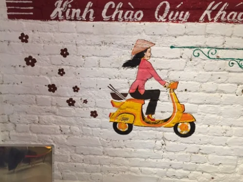 wall mural; vietnamese wall art; exposed brick;