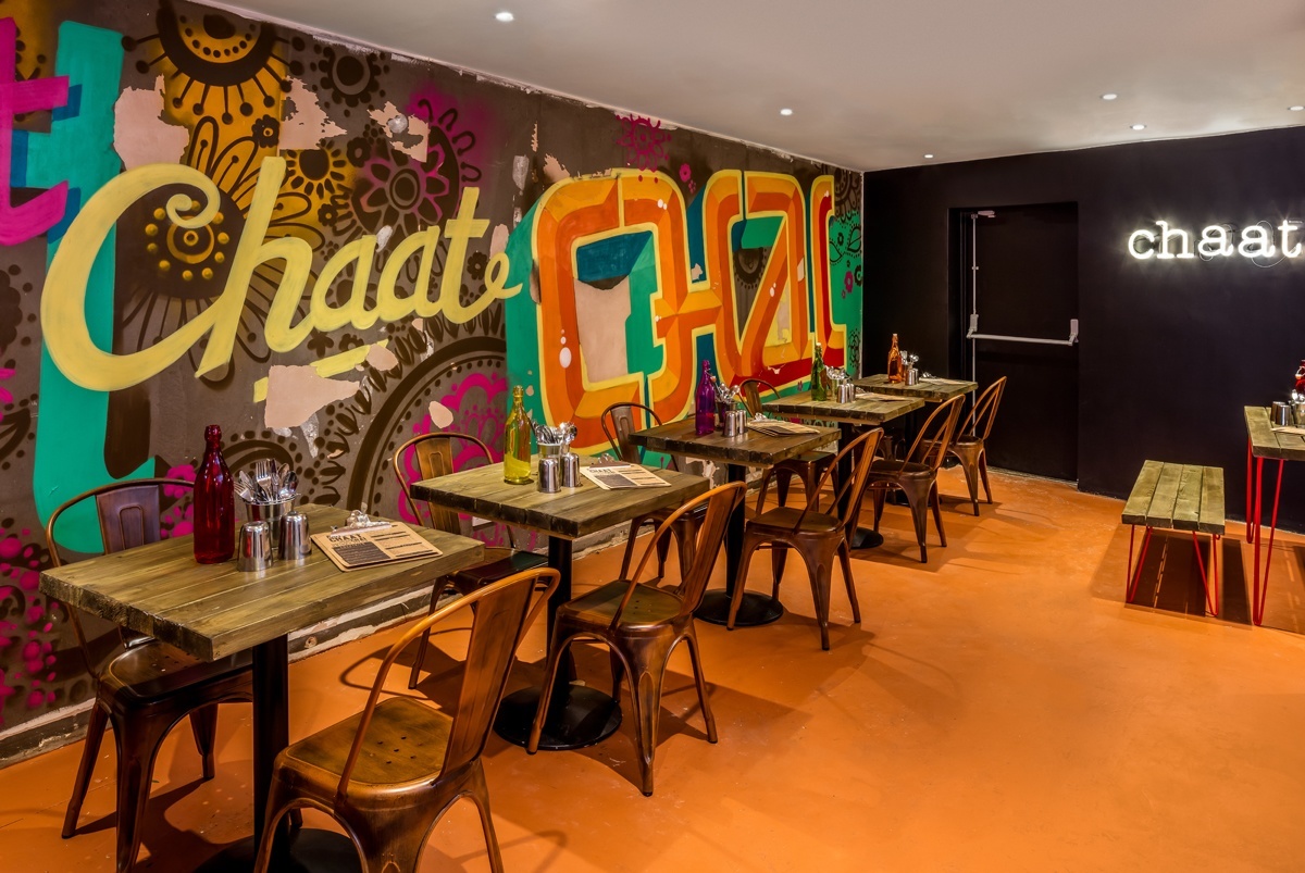 The back dining area has a colourful, intimate vibe. 