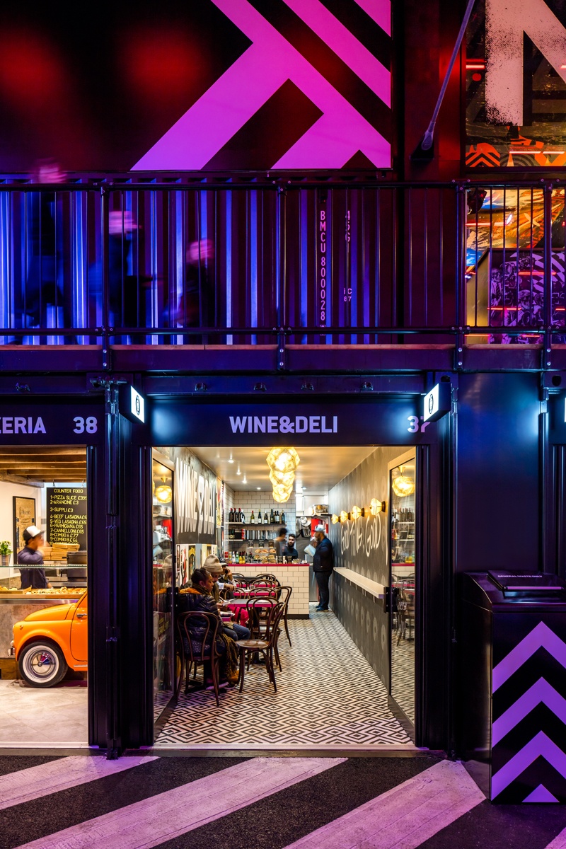 One of 33 new food and drink sites in BoxPark Croydon, Wine & Deli's Urban Deco design helps this independent stand out and attract customers. 