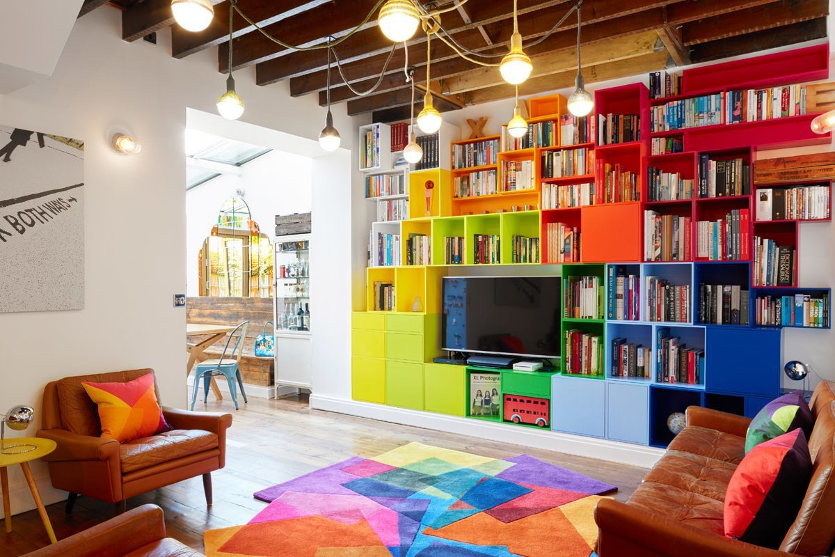 The colourful feature wall with Sonya Winner rug and cushions.