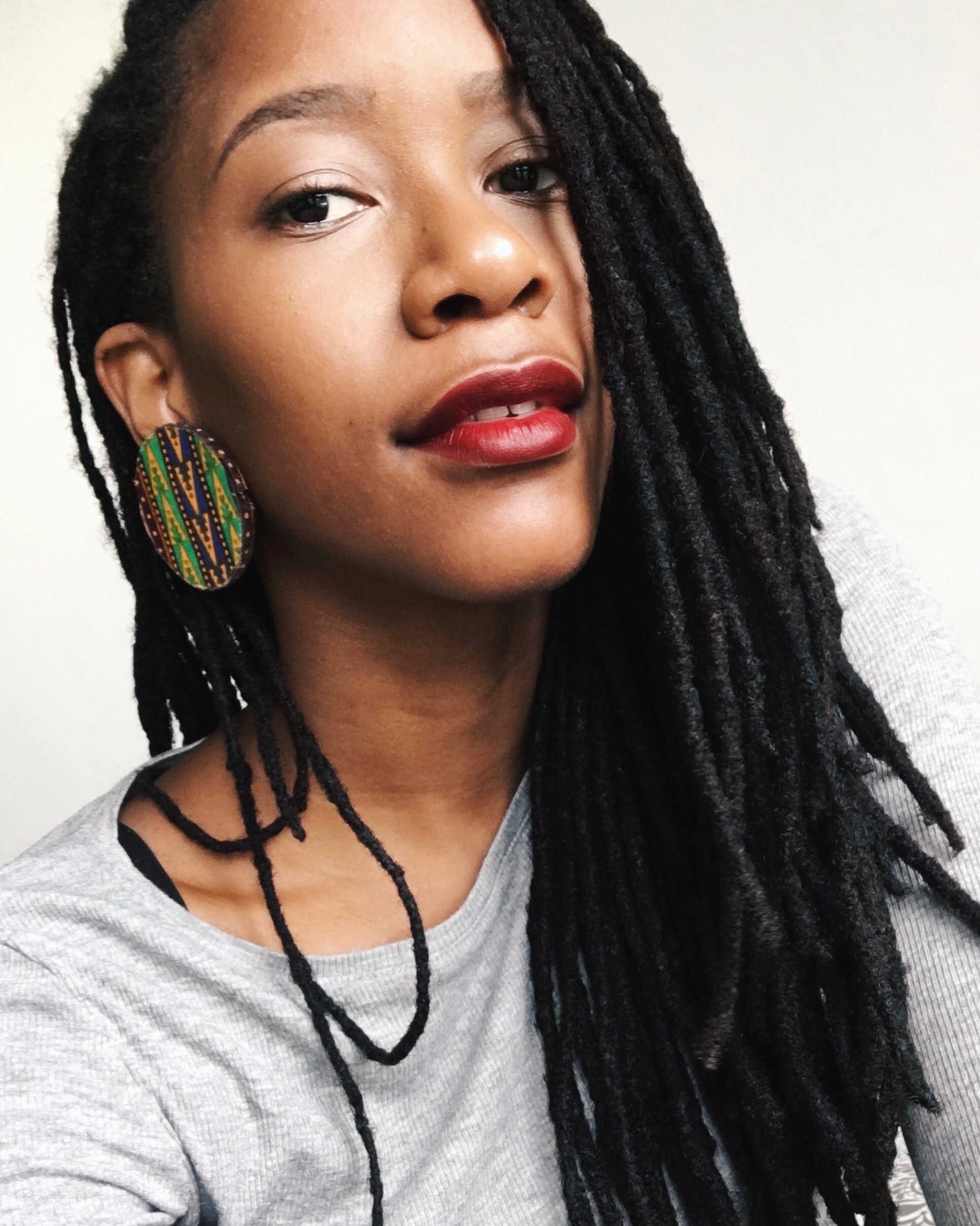 Five years on, long locs and big earrings in Singapore!