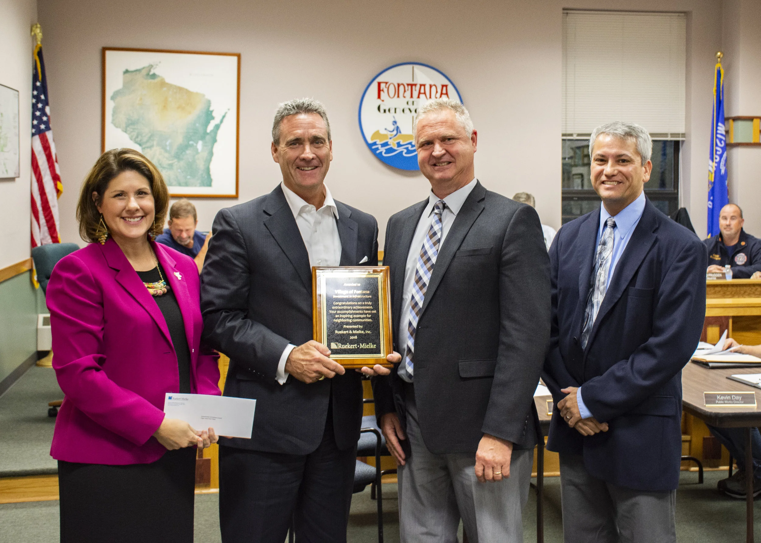 Sara Nichols, Executive Director, Open Arms Free Clinic; Pat Kenny, Village President, Fontana-On-Lake-Geneva; Stan Sugden, President, Ruekert & Mielke, Inc.; Terry Tavera, Sr. Project Engineer, Ruekert & Mielke, Inc.