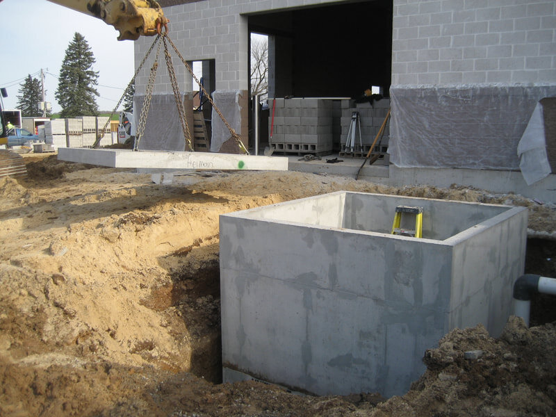 The Parlor Waste Reception Tank Lid being Placed