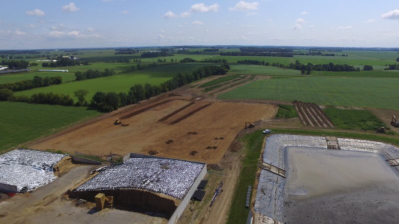 A View of the Existing Feed Storage Area as well as the Adjacent Area where the Proposed Feed Storage Expansion and Waste Storage Facilities will be Constructed