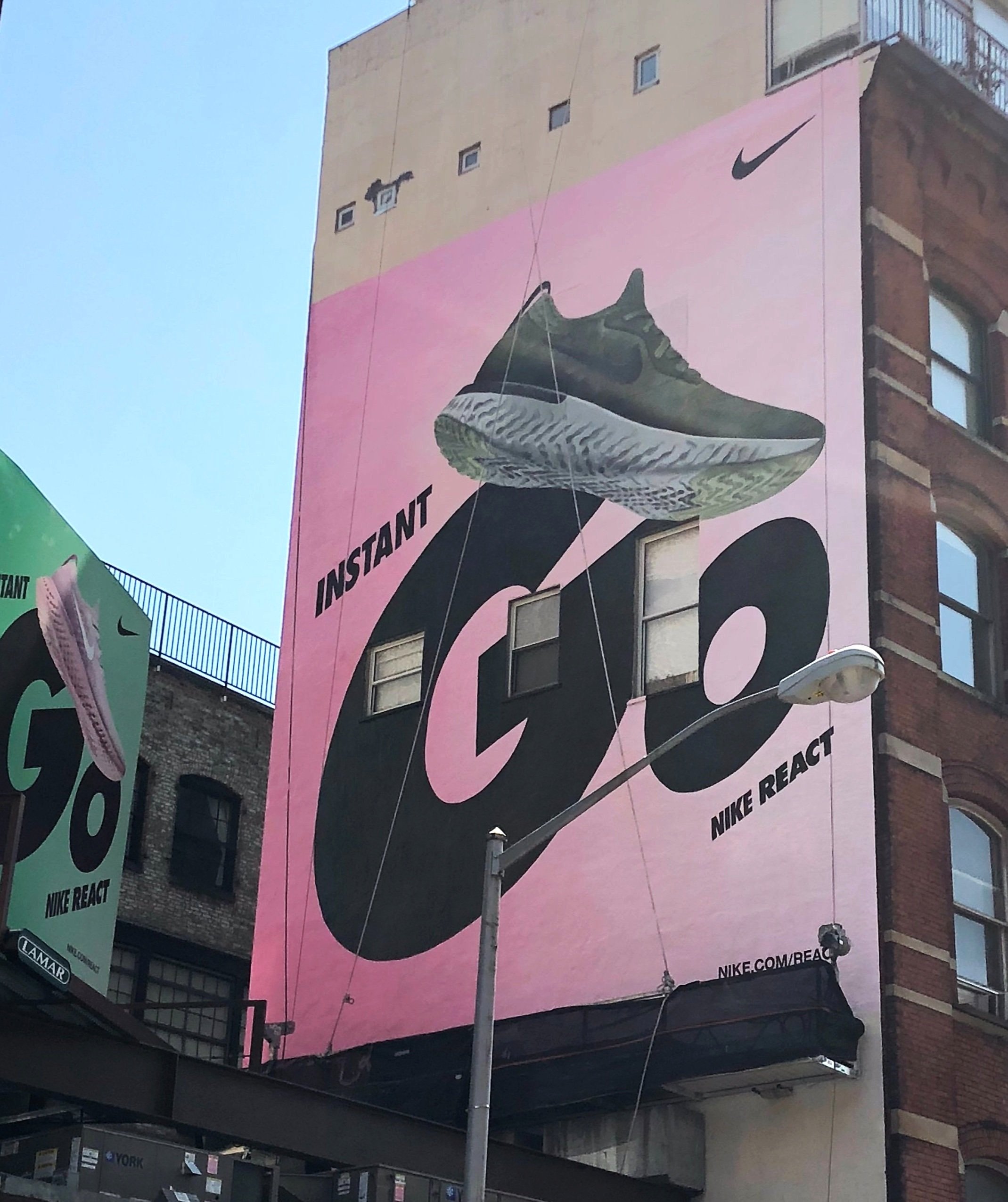 Hand-Painted Advertisement for Nike by Harlan Ballogg and team. New York, NY, 2017. A Good Universe is an artist’s collective founded in 2009, by painters Kari Blak, Harlan Ballogg and John Gingrich MCPAT, LGPC. AGU provides the highest quality la