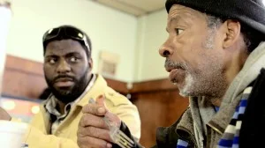 Che Smith enjoys breakfast with his father, Brian Tillman, shortly after their reunion.