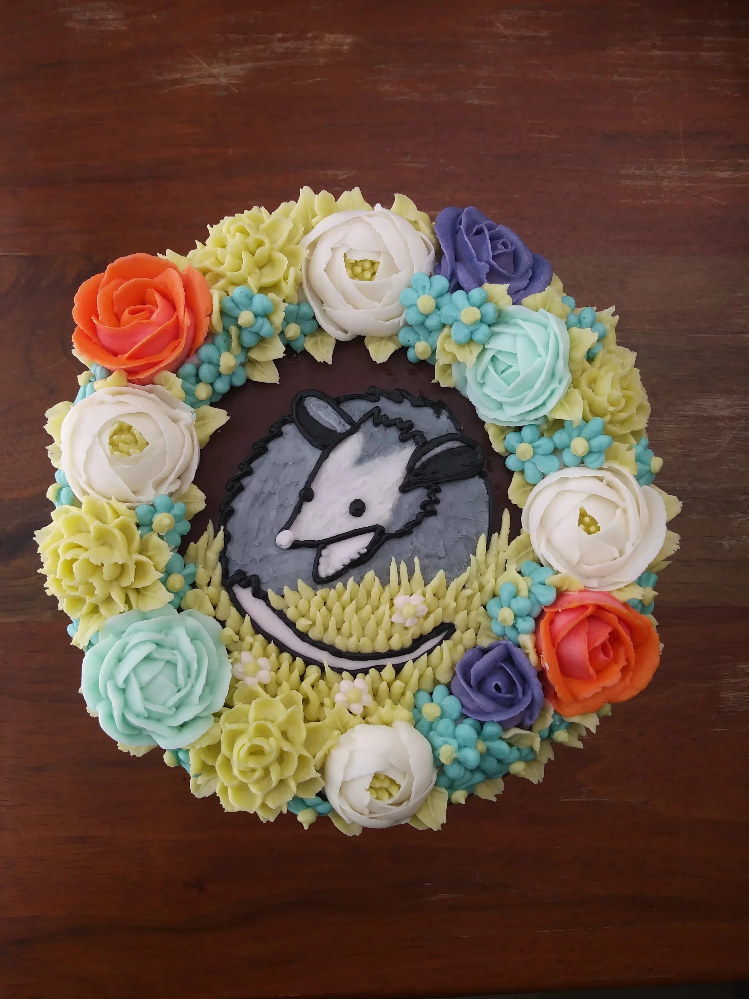A38. Possum and Flowers cake in Buttercream ($30 Deco).JPG