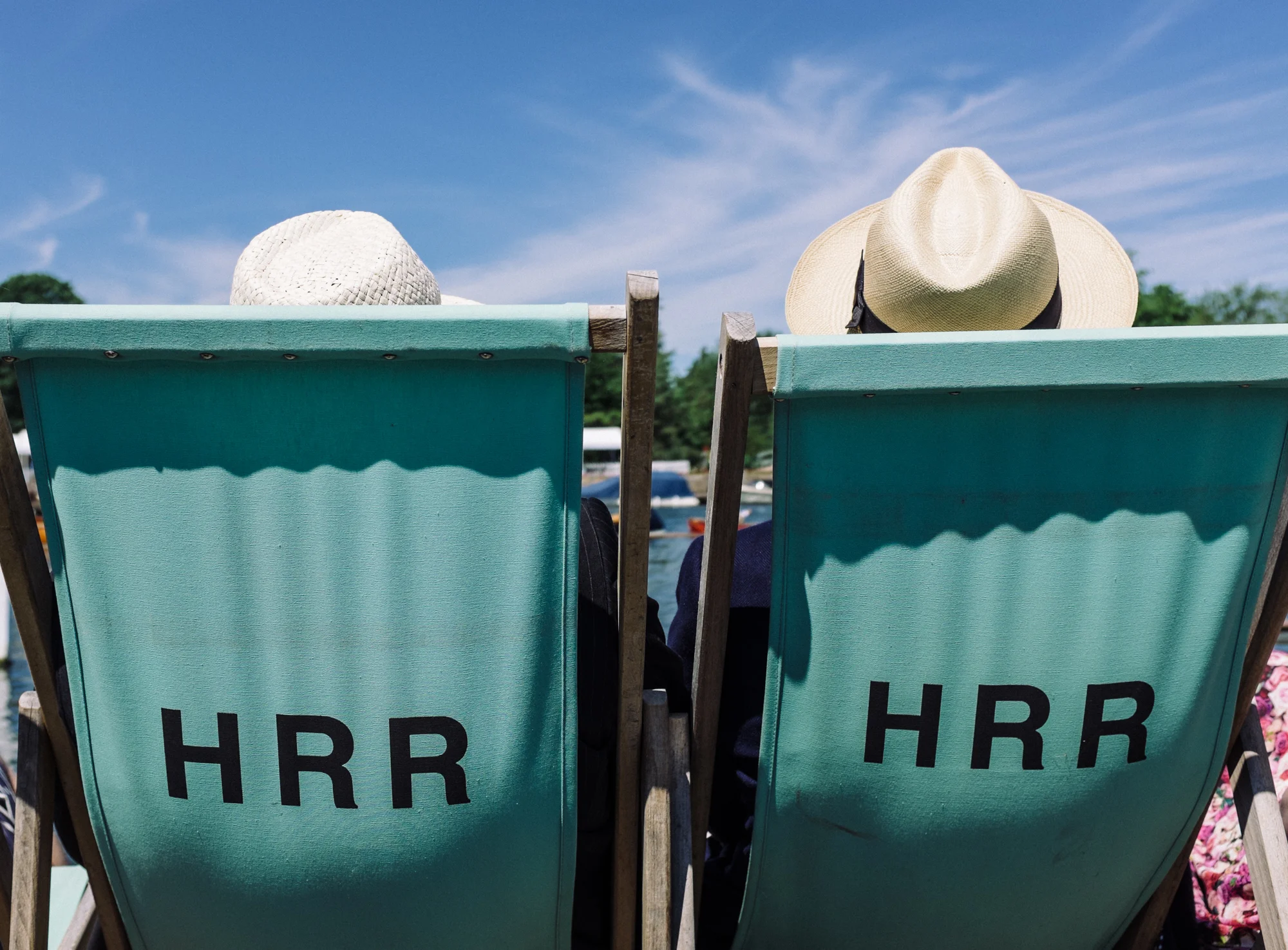  Spectators enjoy a front row seat in the sunshine at Henley Royal Regatta. 