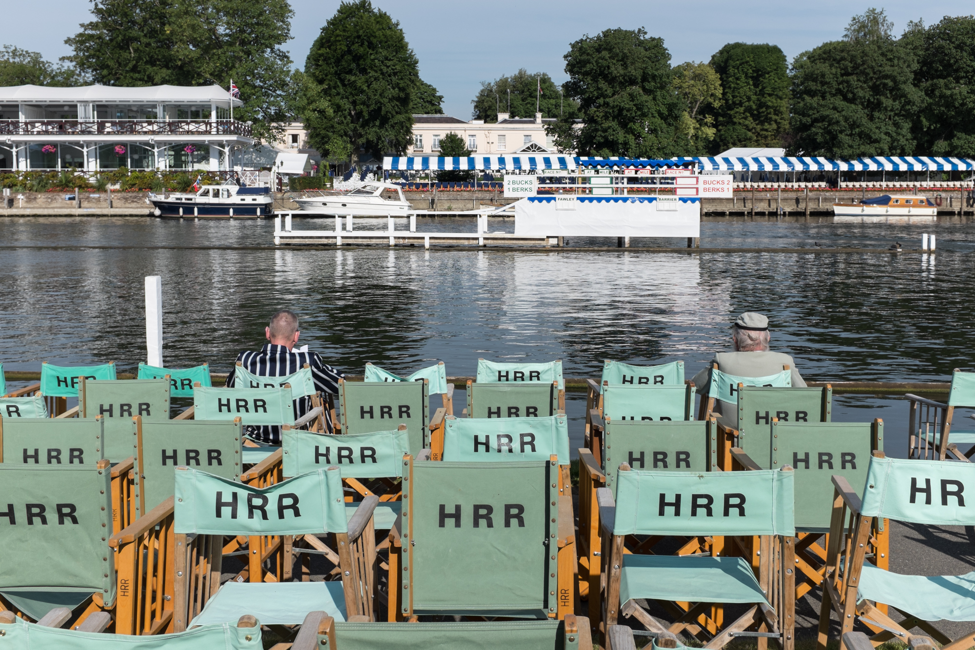 Spectators find a front row seat early before racing starts at Henley Royal Regatta. 