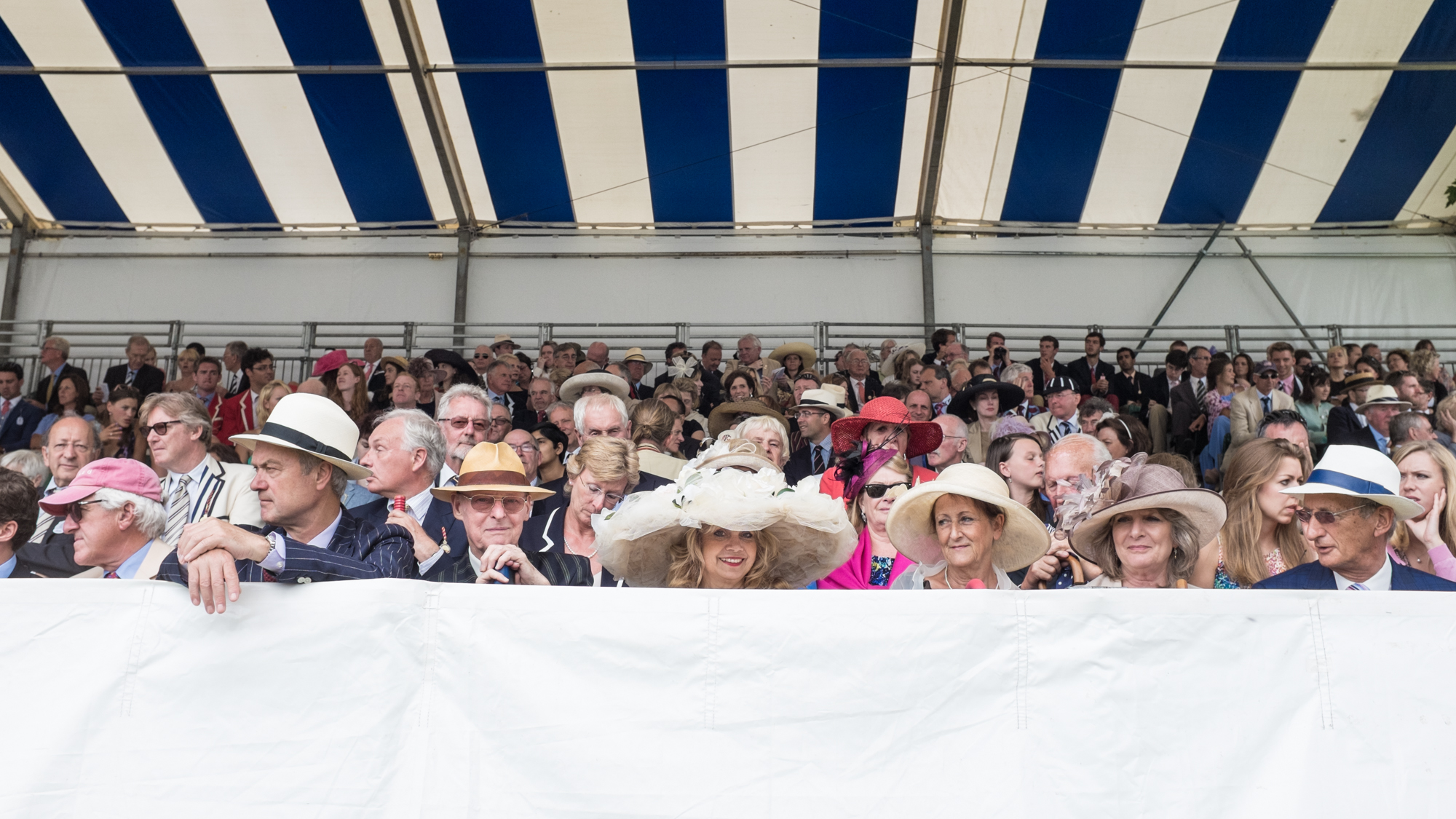  Spectators in the Steward's Enclosure grandstand at Henley Royal Regatta. 