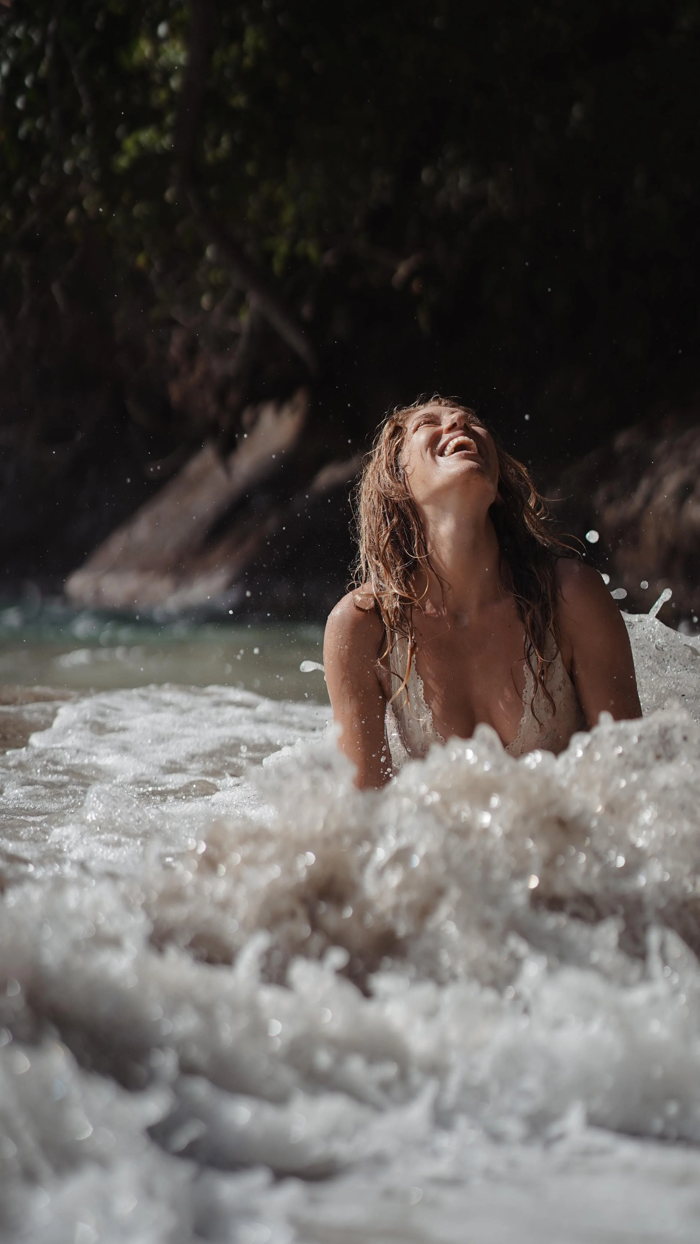 Fern Olivia splashing in ocean nosara costa rica