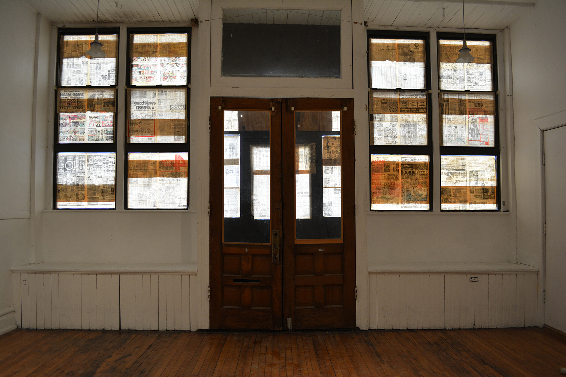 Interior View of Closings (American Celebration Version) Site-specific Installation with Windows and July 4, 1976 Edition of the Detroit News Dimensions Variable
