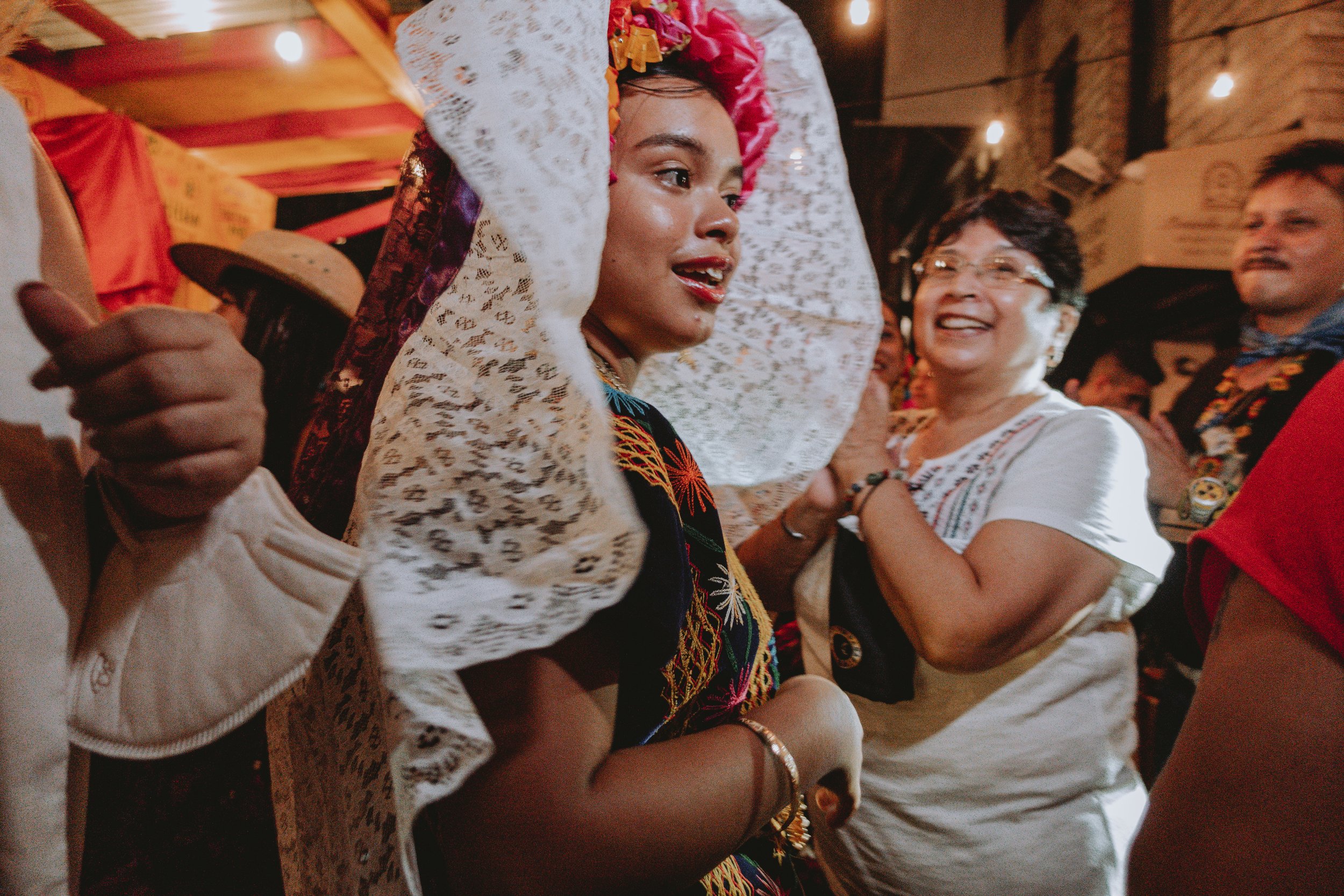  A crowd dances on the sidewalk outside of the restaurant El Kallejon in El Barrio, or East Harlem,  during Fiestas Patrias, traditional celebrations that mark the independence of Mexico from Spain on September 16, 2021.  Personal work   