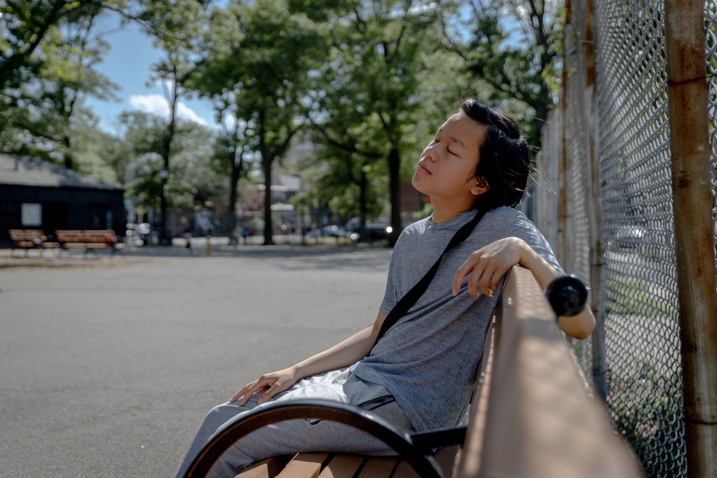  Zhenghao Lin, a New York City high school student, graduated amid the covid-19 pandemic despite the challenges of virtual learning and the anxiety of returning to in-person learning.  Thalia Juarez for Chalkbeat.   