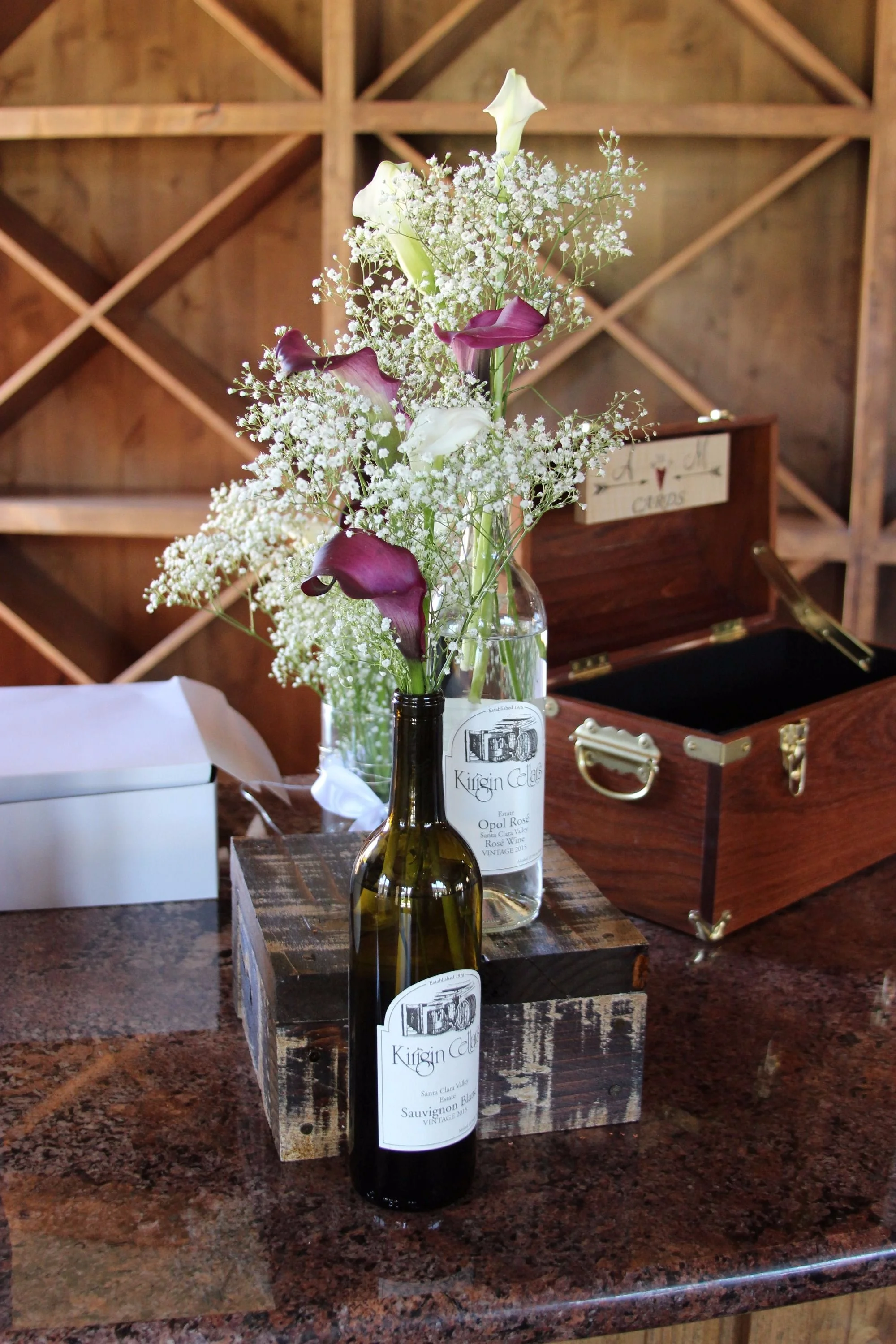 Wine Bottle Centerpieces with statement Calla Lillies