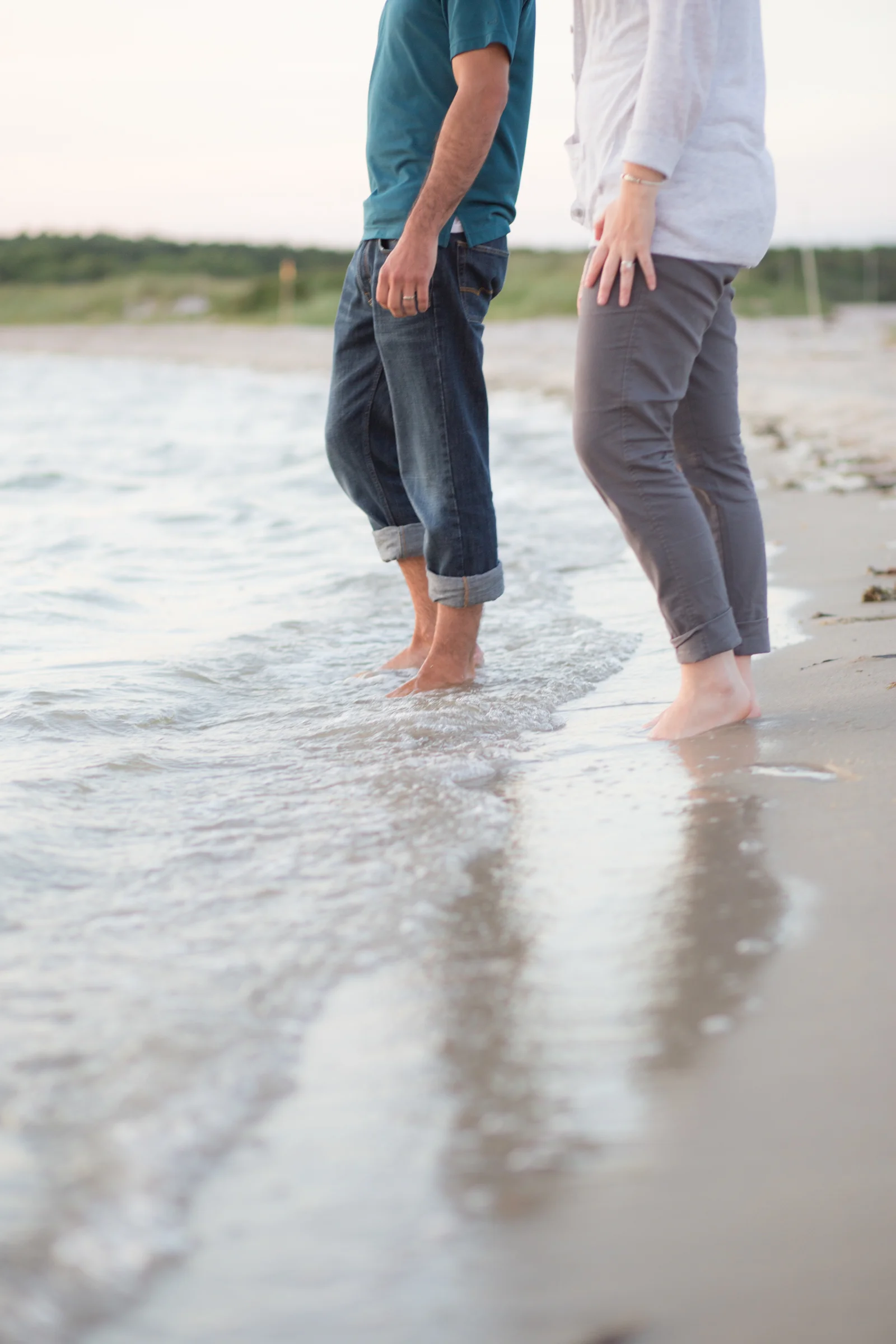Two people in the water during a photo session on Cape Cod, Massachusetts
