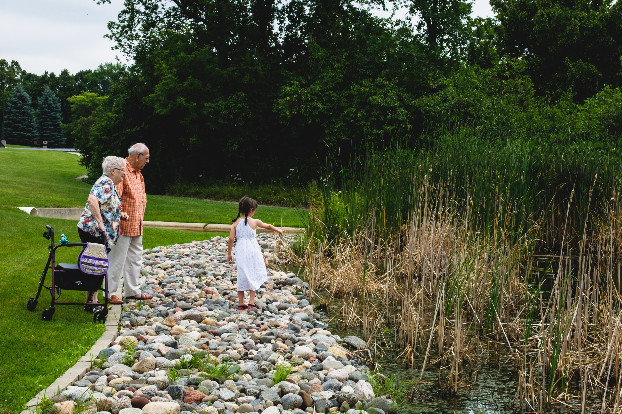 Pointing out a frog to Gaga and Bapa