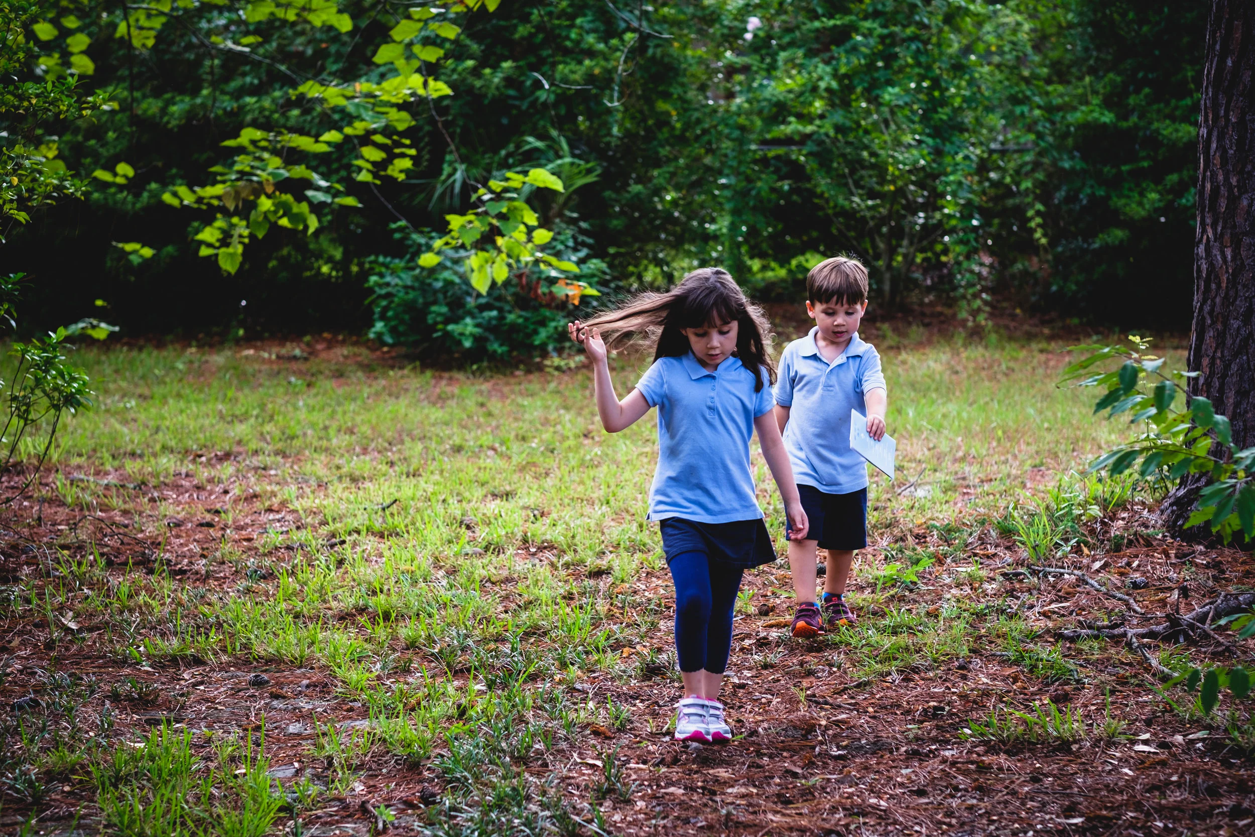 Siblings hard at play. 