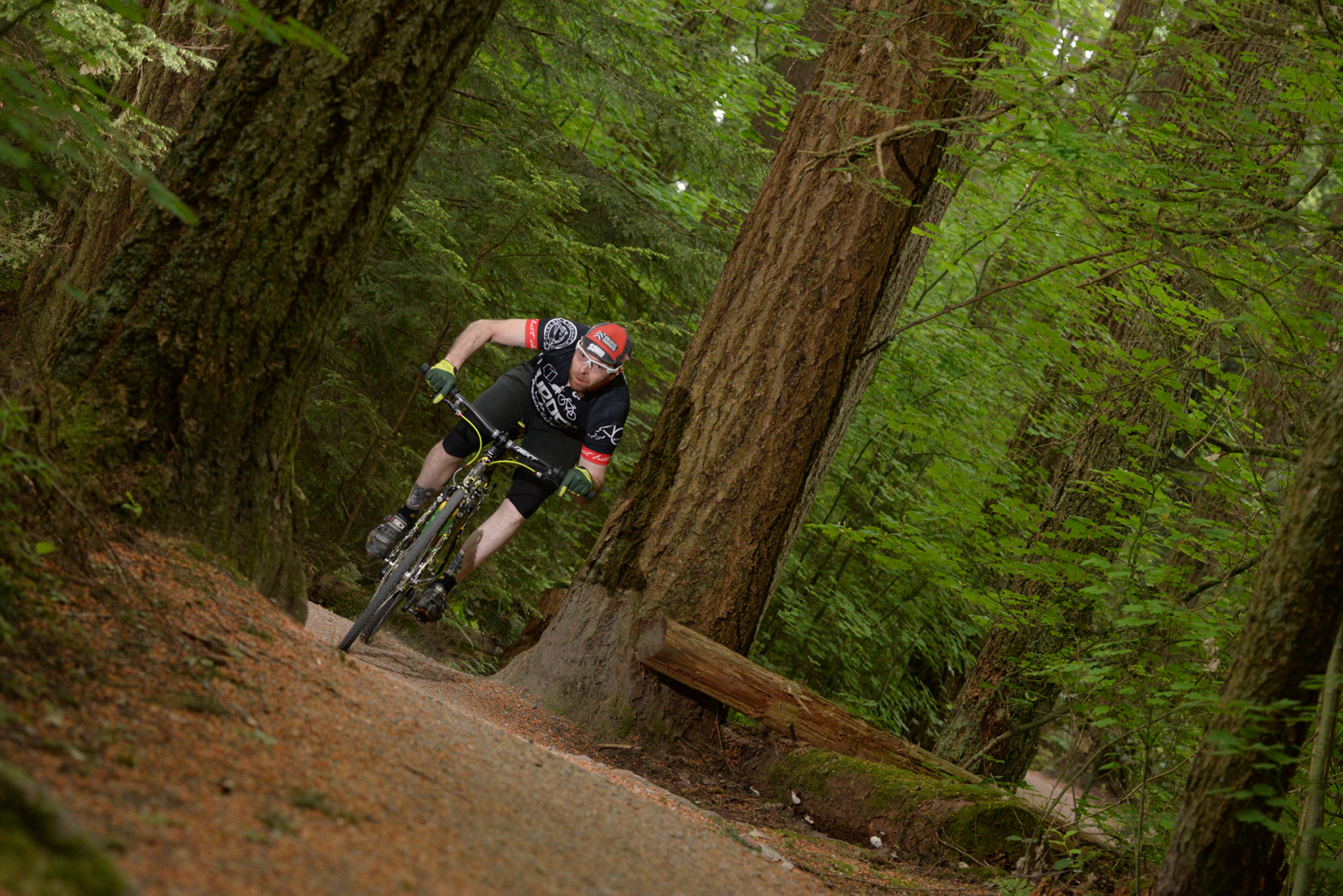   Ross  riding his SSCX through the woods at UBC. Unfortunately I had to take him to get some stitches right after this. 