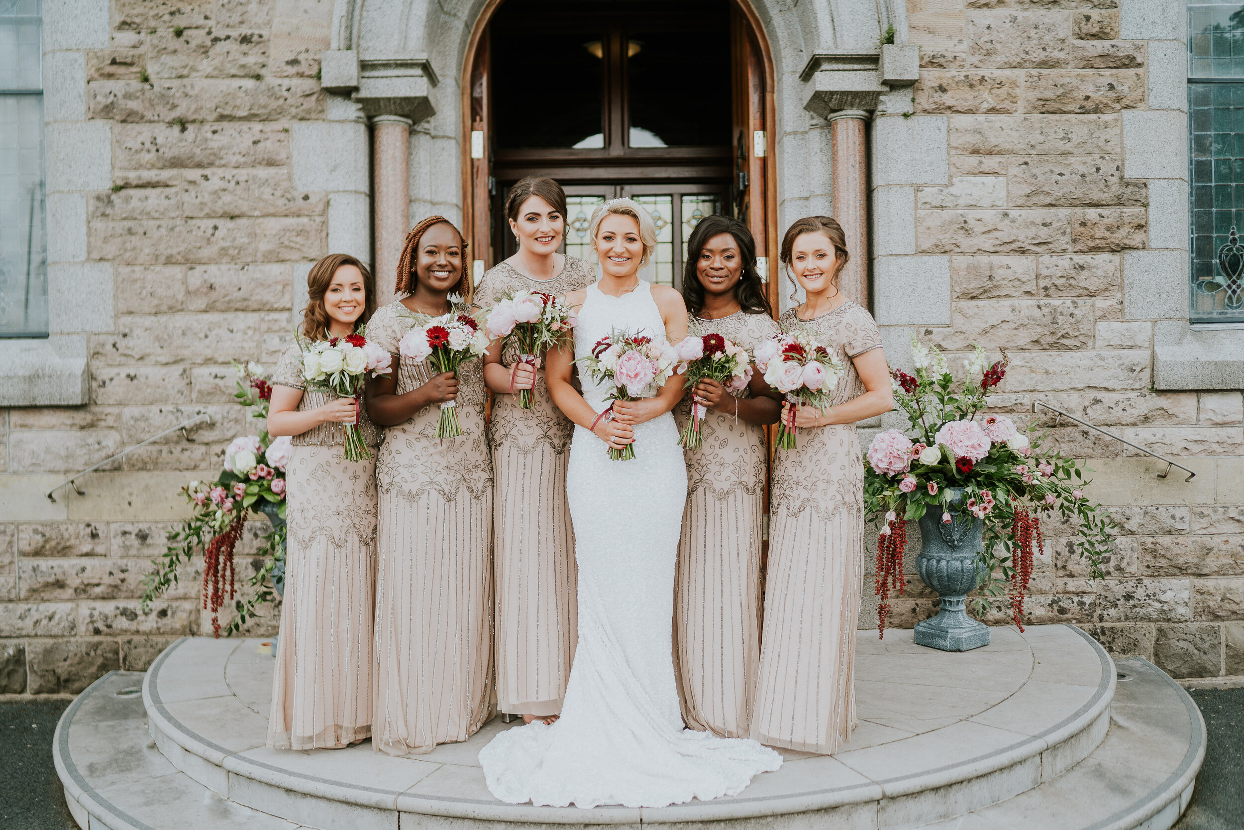 bride and bridesmaids outside assumption church pomeroy 