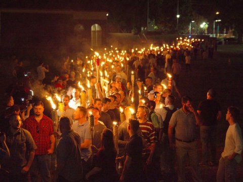 white-nationalists-carry-torches-on-the-grounds-of-the-university-of-virginia-on-the-eve-of-a-planned-unite-the-right-rally-in-charlottesville-virginia-us-august-11-2017-alejandro-alvareznews2share-via-reuters.jpg