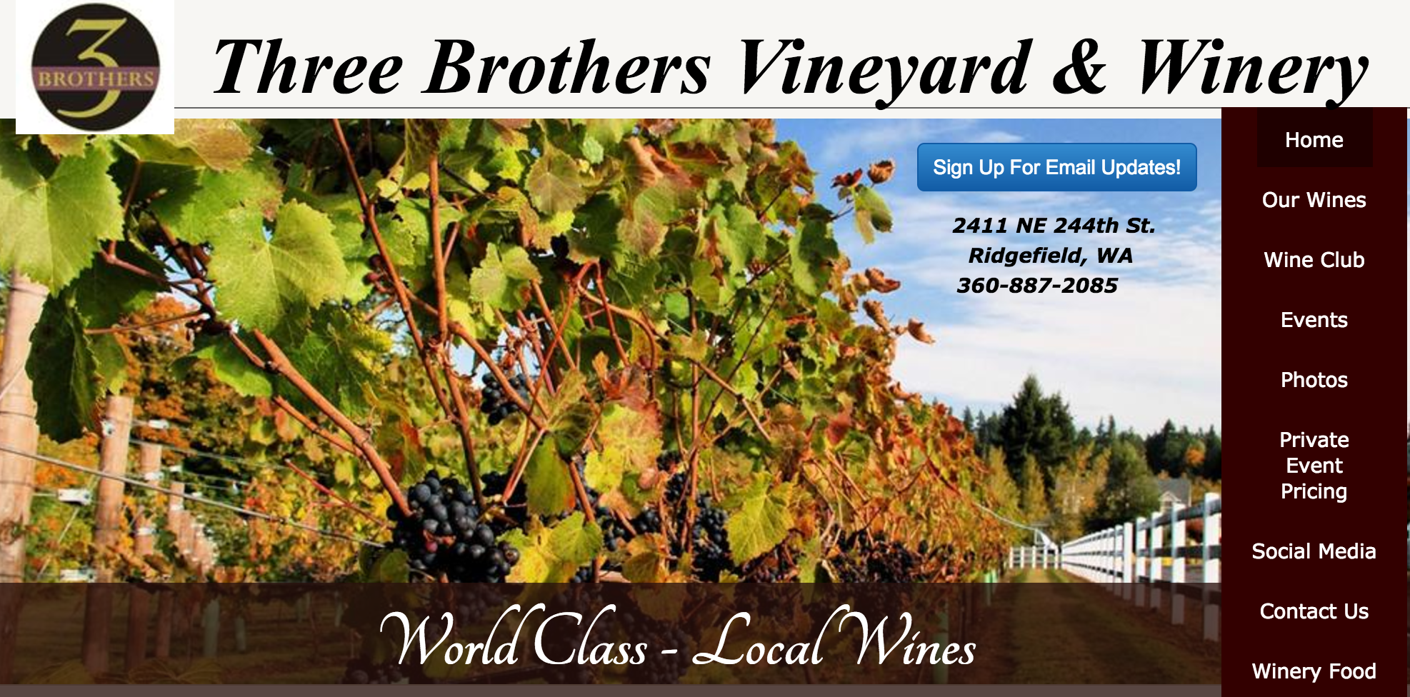 Reading and signing at Three Brothers Vineyard & Winery