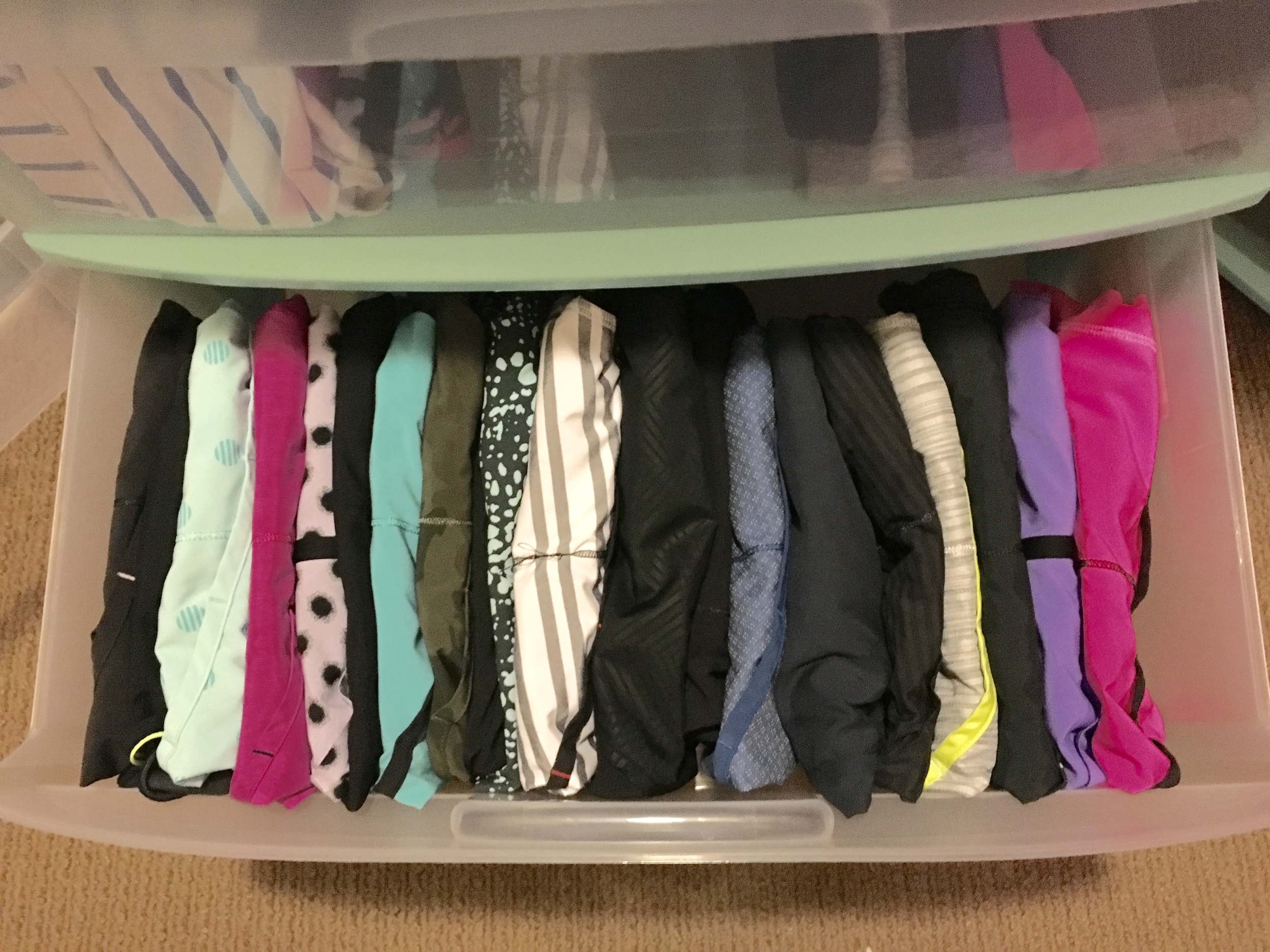 These are athletic/running shorts. You may find you need to confine them within a couple shoe boxes/dividers so that the piles don't fall over when you remove a few pairs. This isn't a problem with tees/jeans/etc, but for loose and slippery things, a box helps!